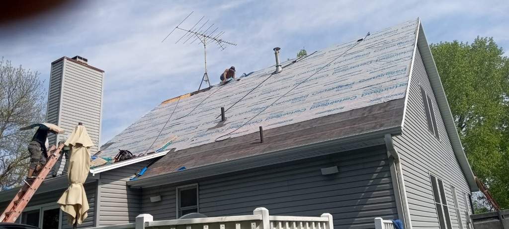 Residential Roofing Installation using Certainteed Landmark Moire Black by MODERN EXTERIOR SYSTEMS