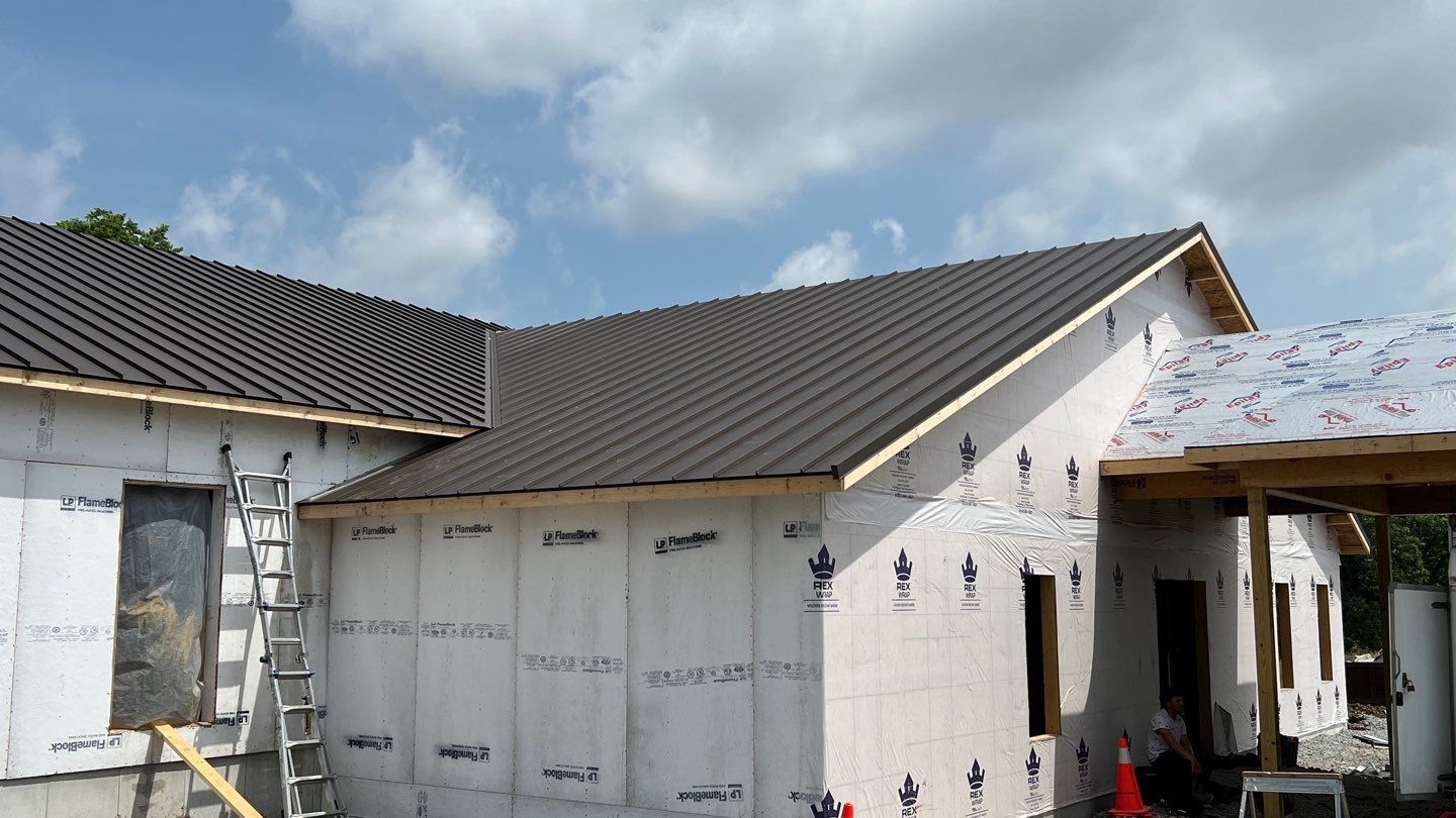 Commercial Roofing Installation using Standing Seam Metal - Burnished Slate Frost by RoofX 