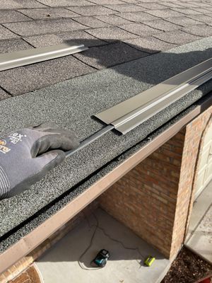 Turtle Shell gutter protection installation in Naperville, IL 60565, photograph 26