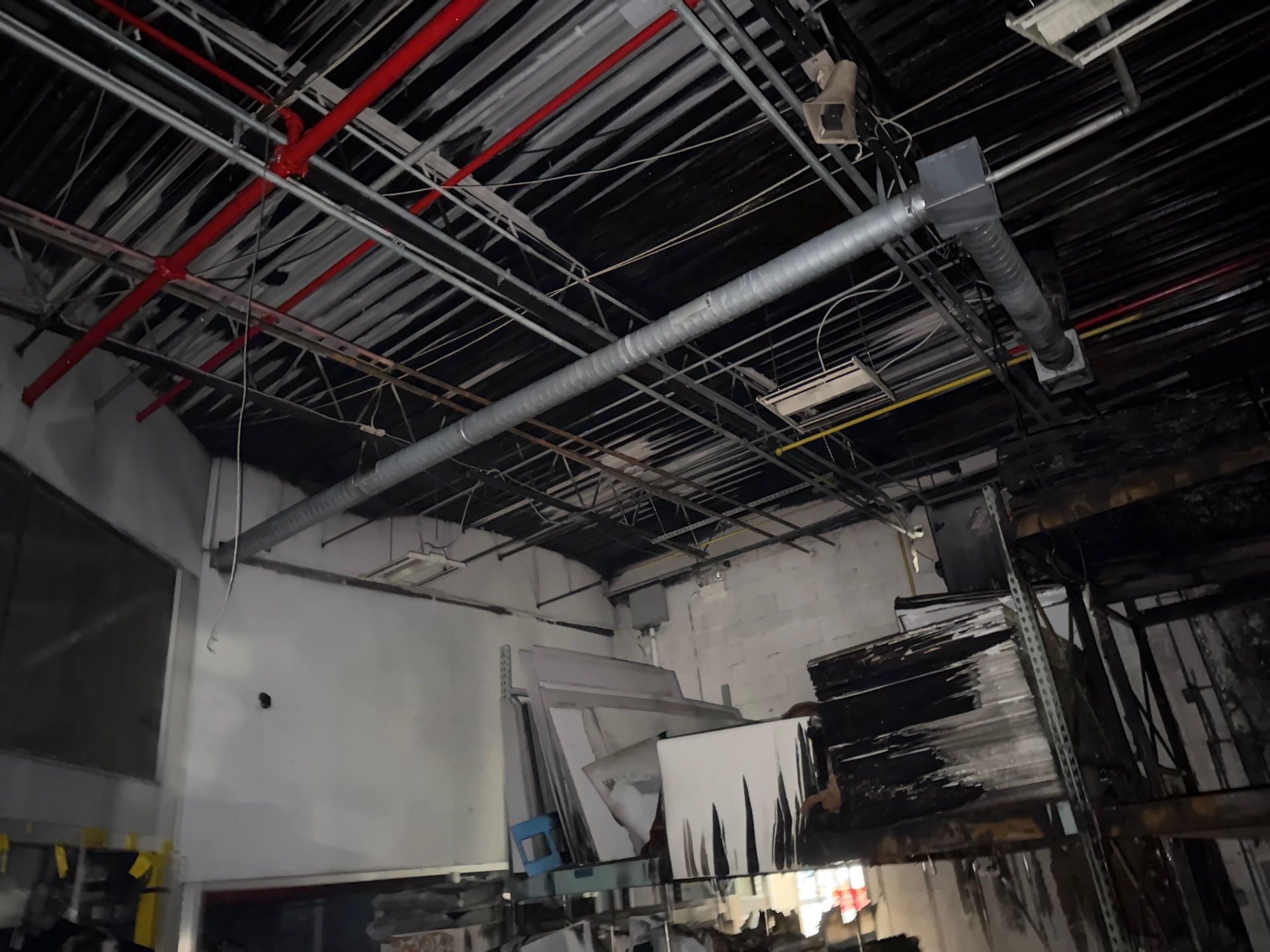 Industrial Warehouse Fire Damage Cleaning and Spray Sealing in Islandia by EMS Restoration Corp