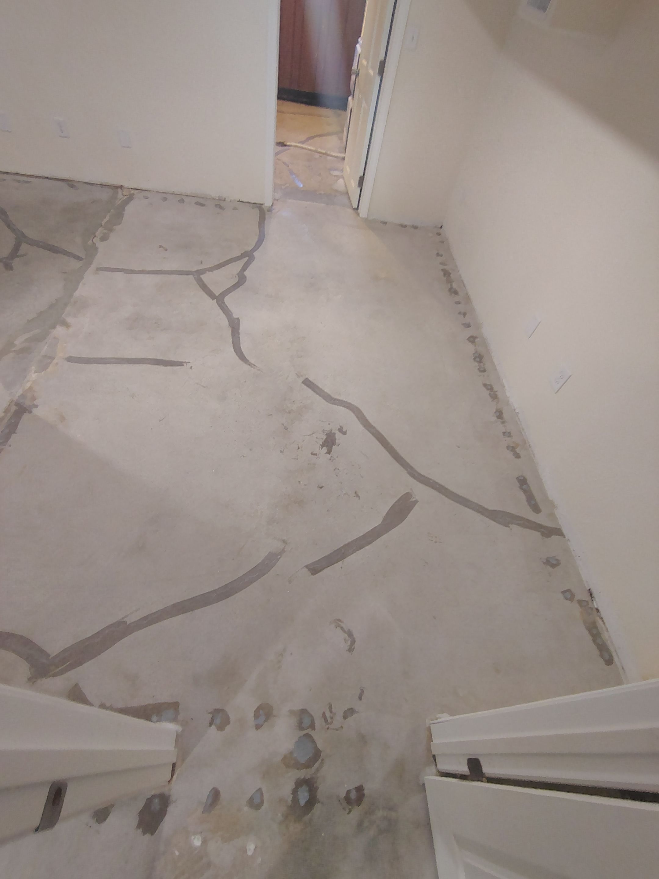 Comprehensive Basement Concrete Floor Coating and Crack Repair in Sioux Falls by Select Painting, Coatings & Garage Cabinets
