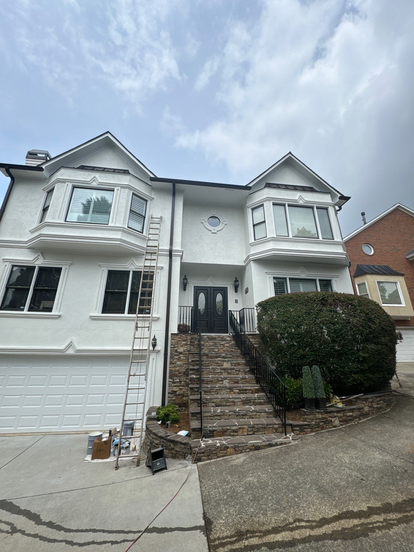 Full Exterior Stucco Painting and Wood Deck Staining in Atlanta by Swift Home Renovations