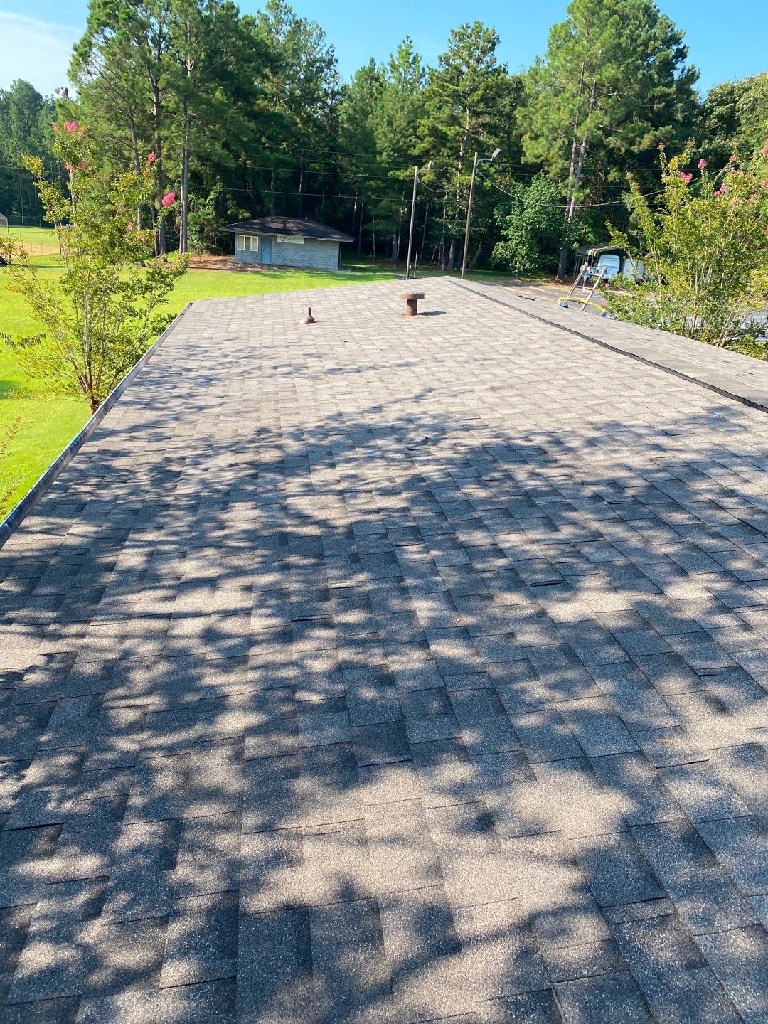 Commercial Roofing Installation using Roof Replacement by American Roofing & Construction LLC