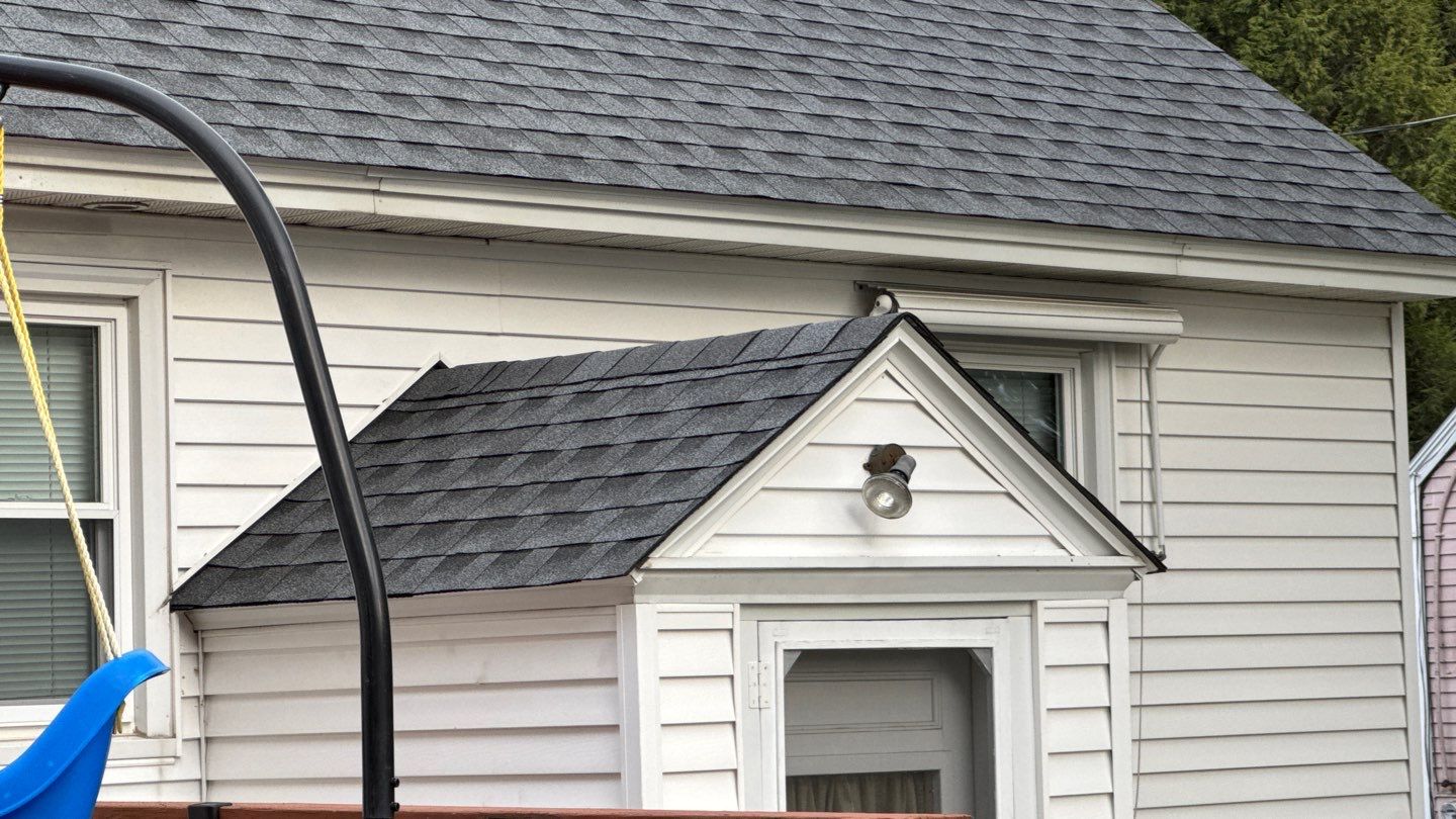 Complete Roof Replacement with GAF Pewter Gray HDZ™ Shingles, VELUX Skylights & New Gutters by Sensible Home Solutions