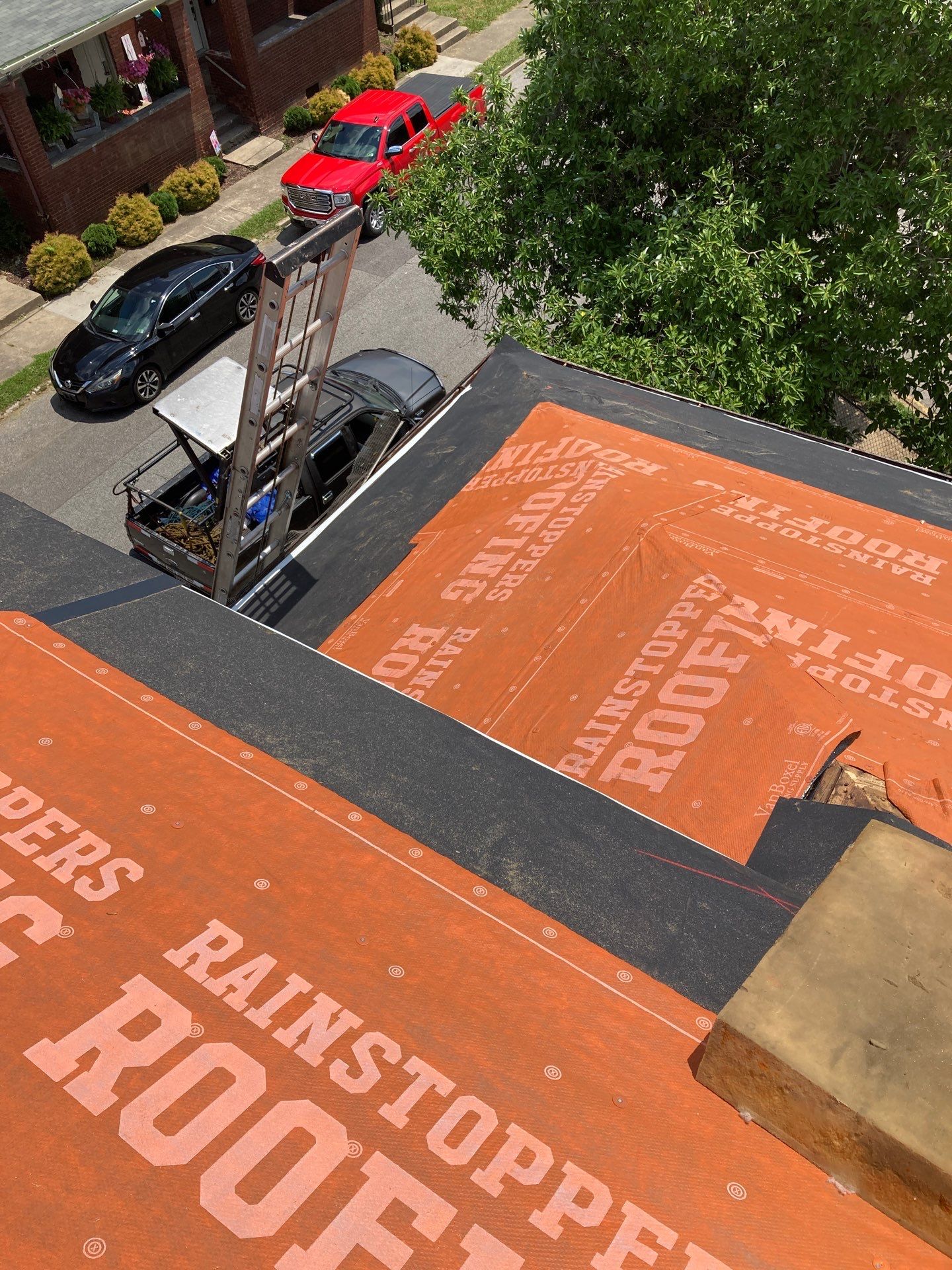 Residential Roofing Installation using GAF TImberline HDZ Hickory by Rainstoppers Roofing