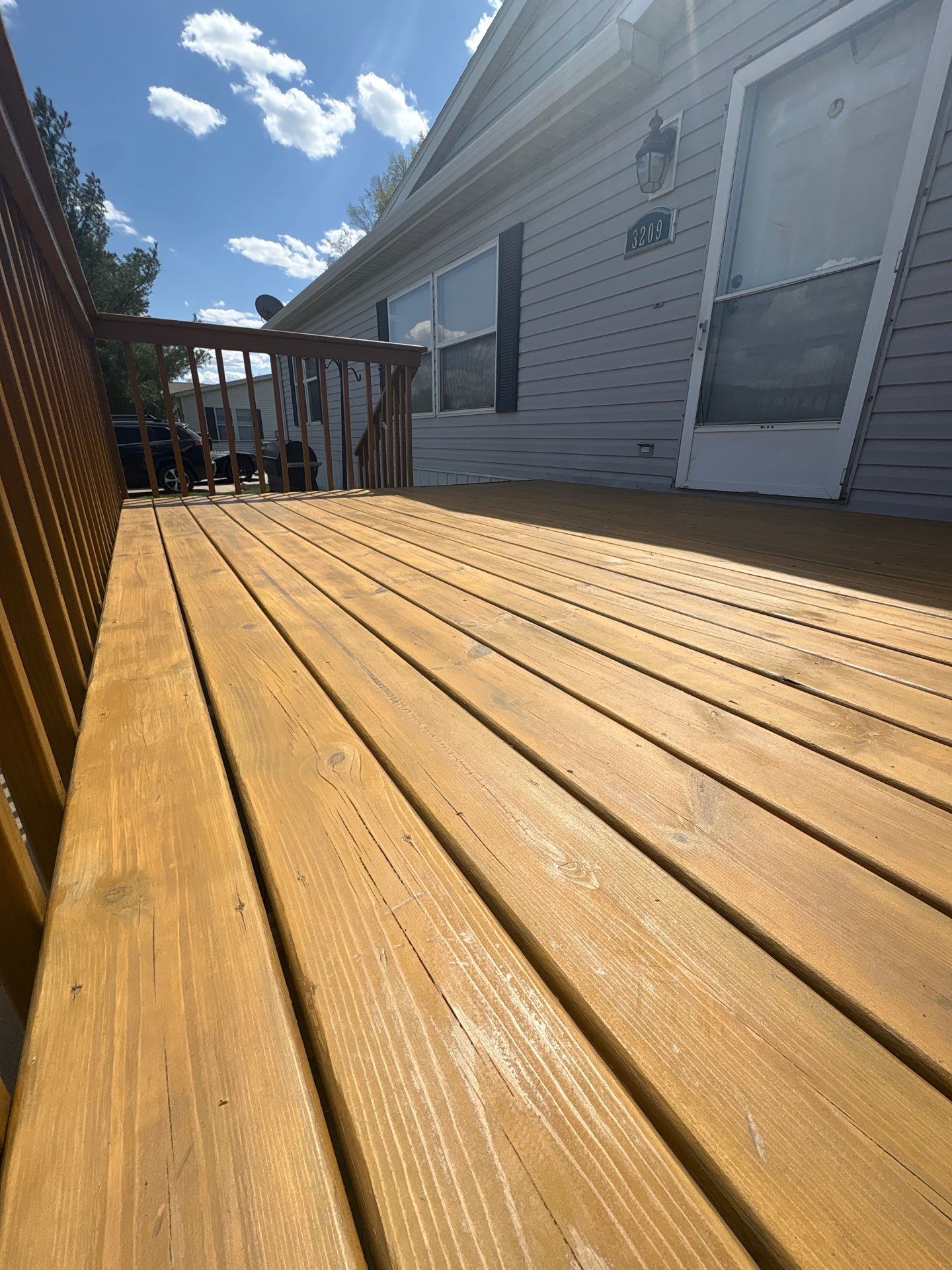 Wood Deck Staining and Interior Paint Refresh in Sioux Falls by Select Painting, Coatings & Garage Cabinets
