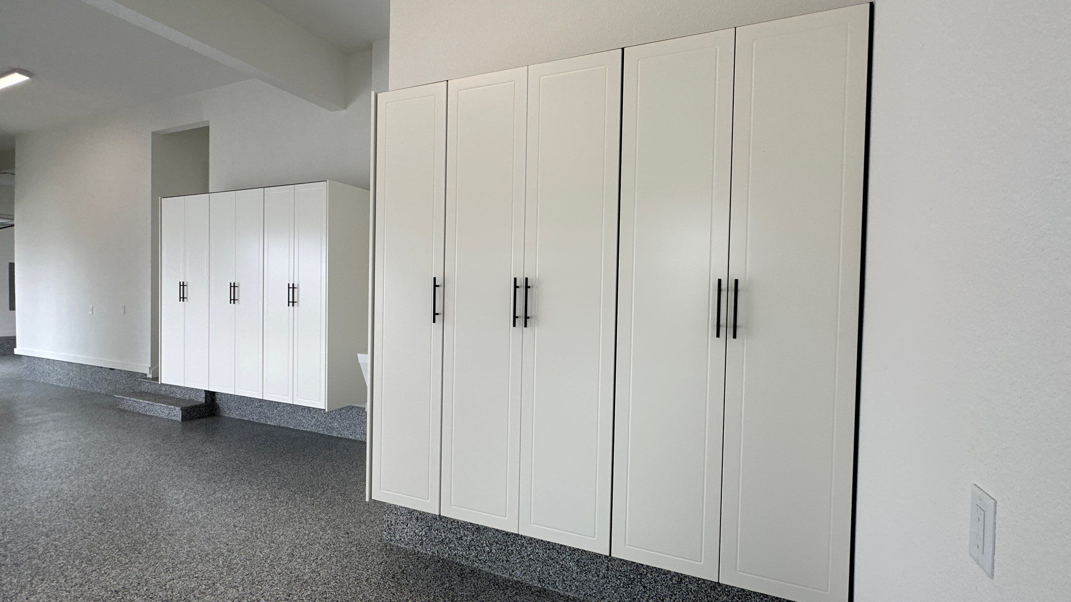 Mike & Pam transformed their garage with a Banner Garage Floor and Cabinets by Banner Garage