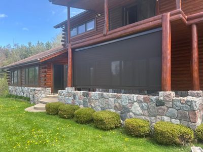 Sunesta Retractable Screen Installation on a Petoskey Log Home Porch