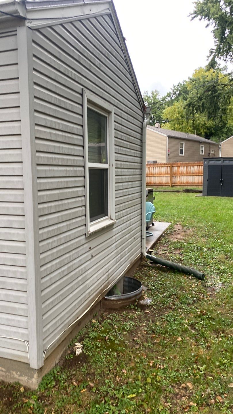 A whole new look for this Gladstone Home  by EEC  Windows, Siding & Roofing 