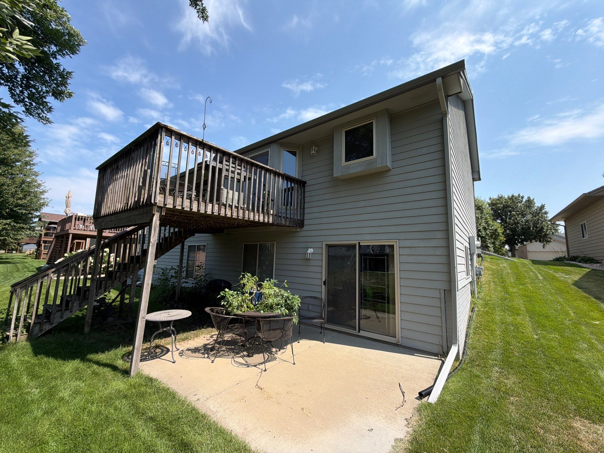 Exterior Painting for Vinyl Siding and Trim in Sioux Falls by Select Painting, Coatings & Garage Cabinets