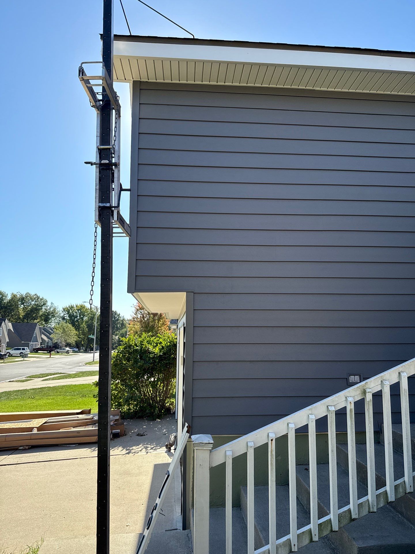 Split Entry in Smokey Ash Craneboard D7 by EEC  Windows, Siding & Roofing 