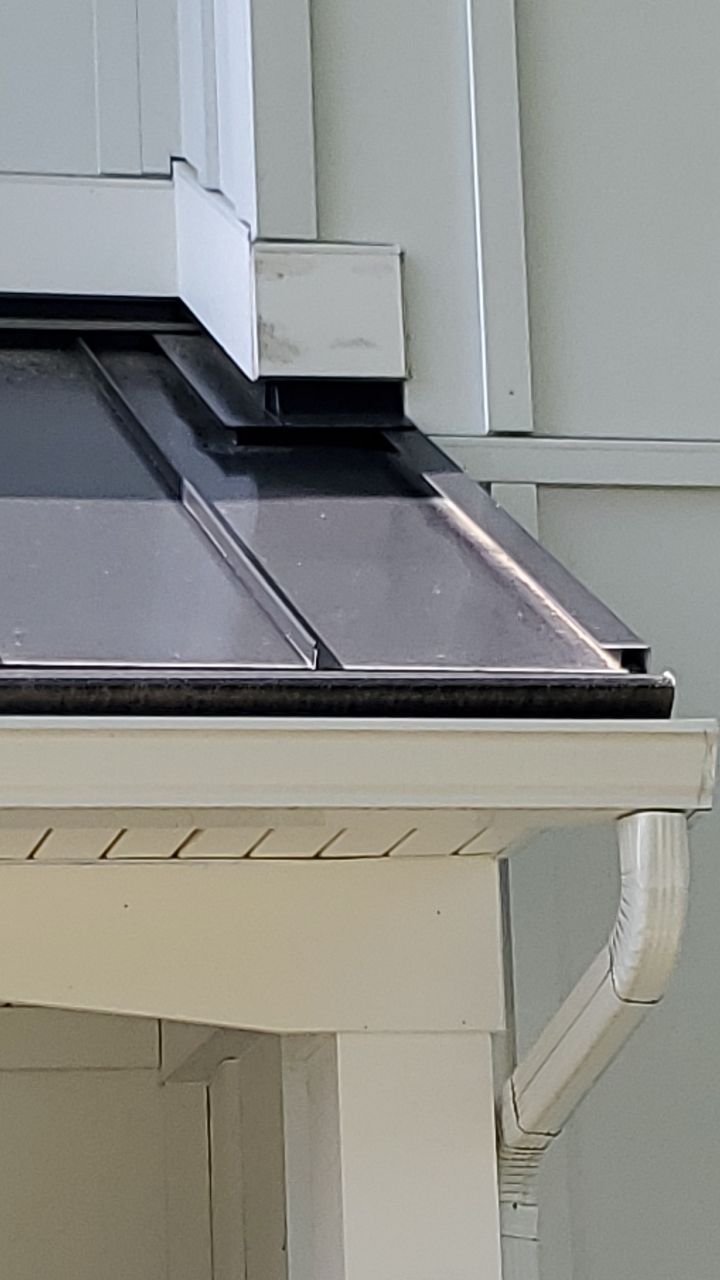 James Hardie Siding  using James Hardie Board and Batten, White by Absolute Roofing and Construction