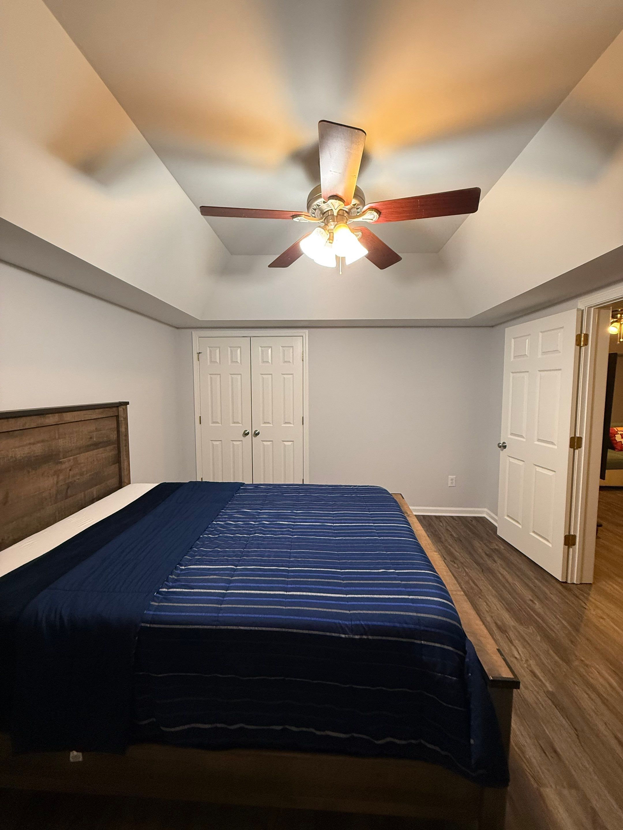 Full Basement Remodeling with Custom Flooring and Tray Ceilings in Marietta by Swift Home Renovations
