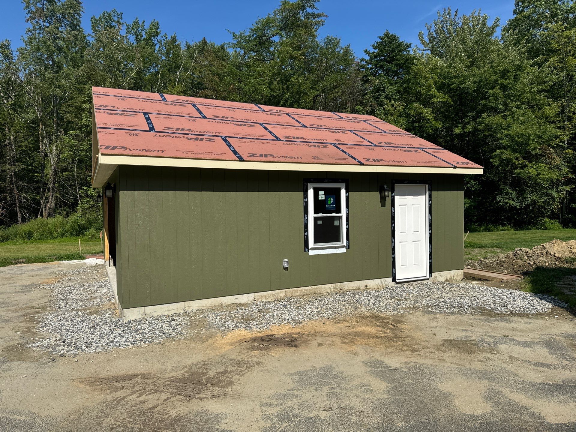 Two-Car Garage using LP SmartSide Panel Siding by Chagnon Building & Remodeling LLC