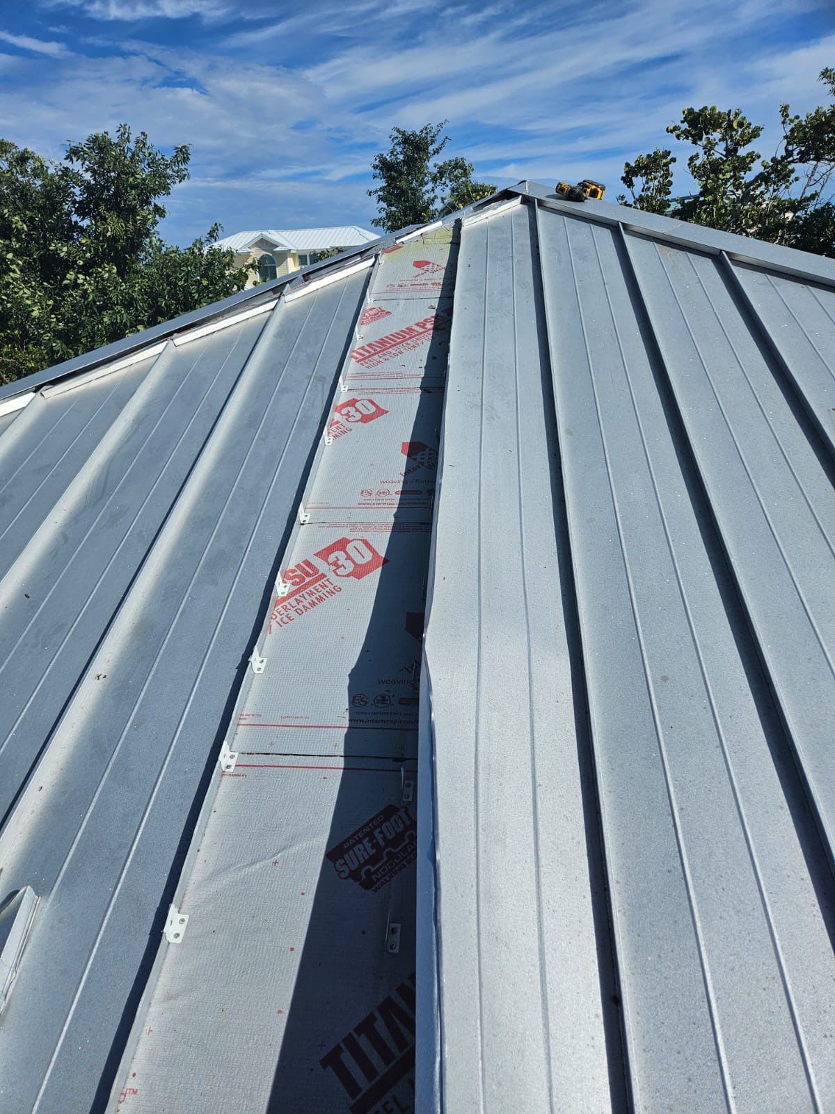 Residential Roofing Repair using Gulf Coast Metals Gulf Seam Panels by Four Peaks Roofing