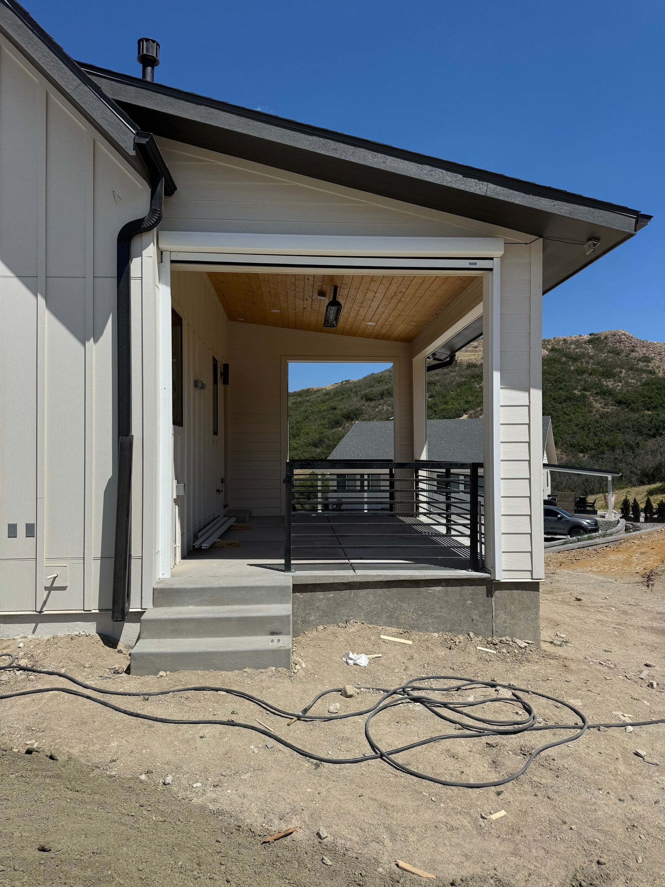 Custom Exterior MagnaTrack Screens for Modern Farmhouse Patio in Castle Rock by Outdoor Solutions Colorado