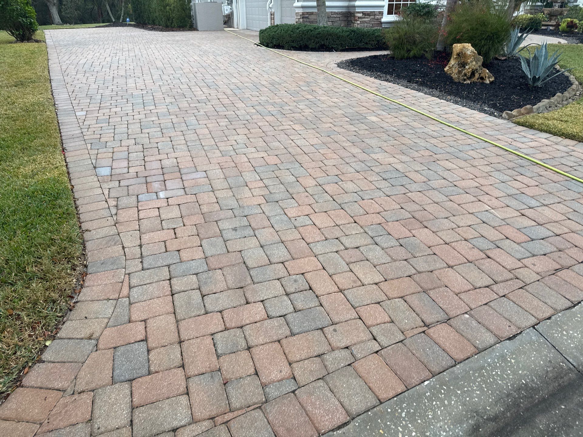 Oil & Tar Removal from Paver Driveway & Entryway by Sunshine AquaWash