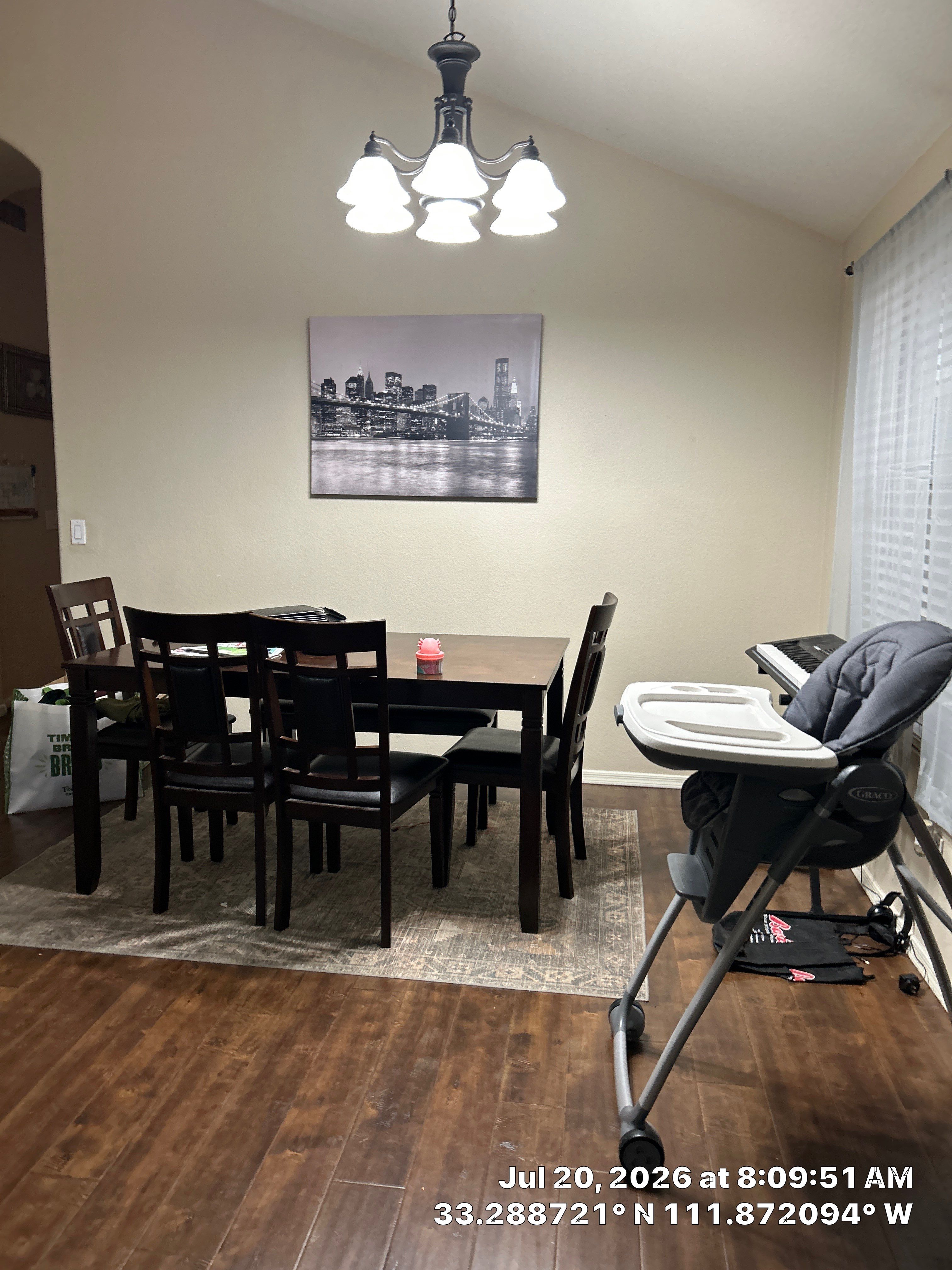 Dark Wood-Look Laminate Flooring Installation in Chandler Dining Room by CompanyCam Sales Demo