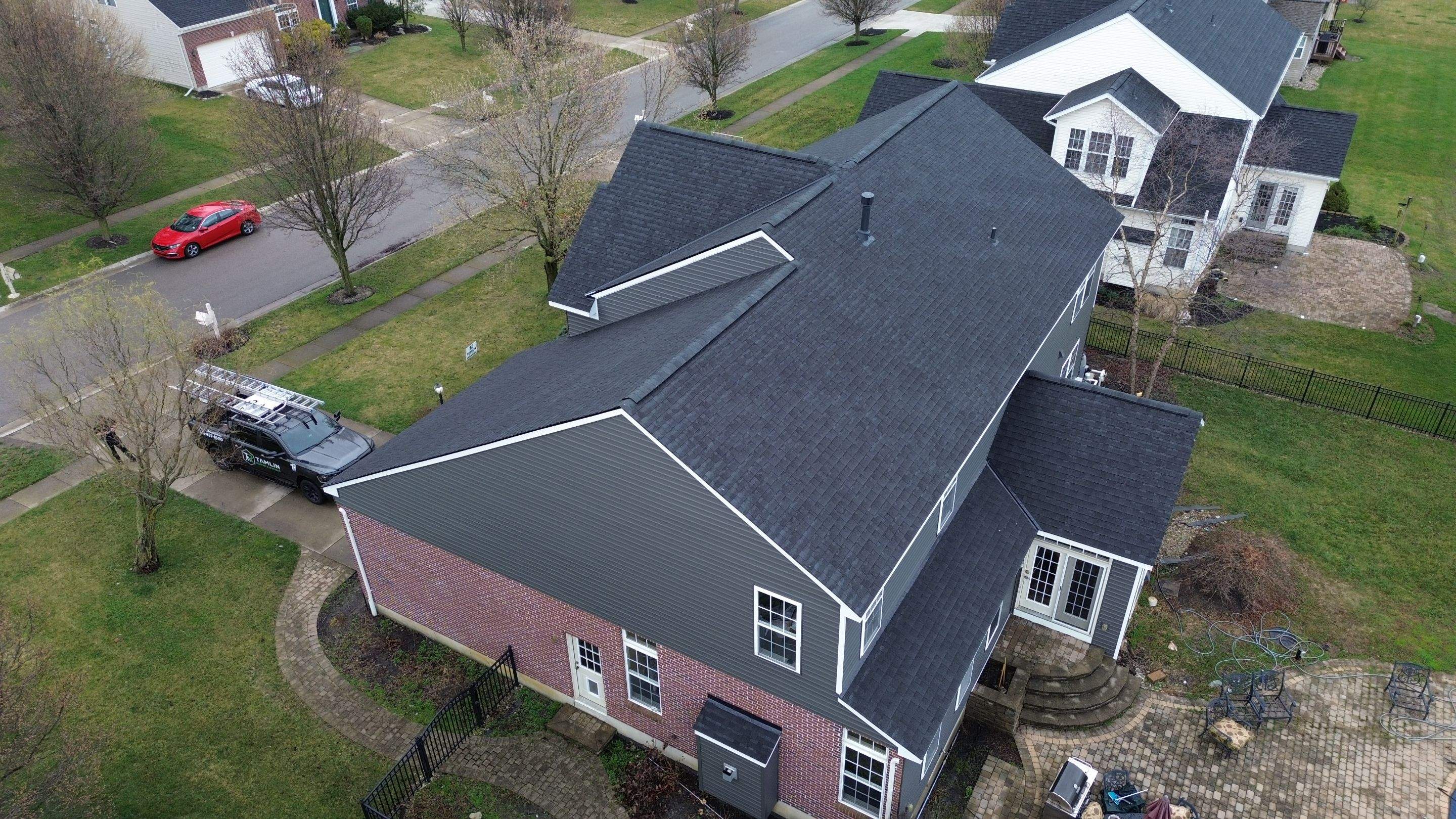 Roofing & Siding  by Tamlin Roofing