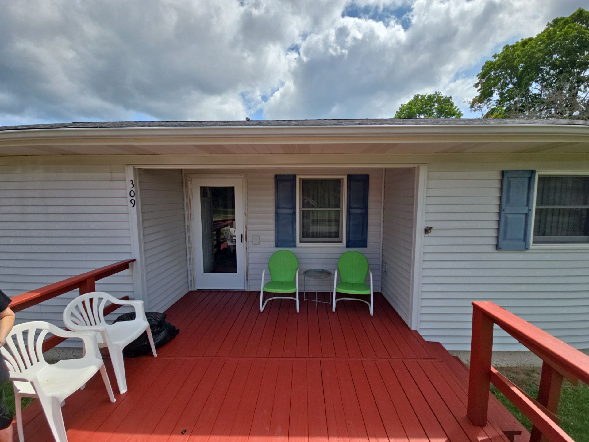 Sunesta Retractable Awning Installation for Lake City Residential Deck by Rainbow Seamless Systems