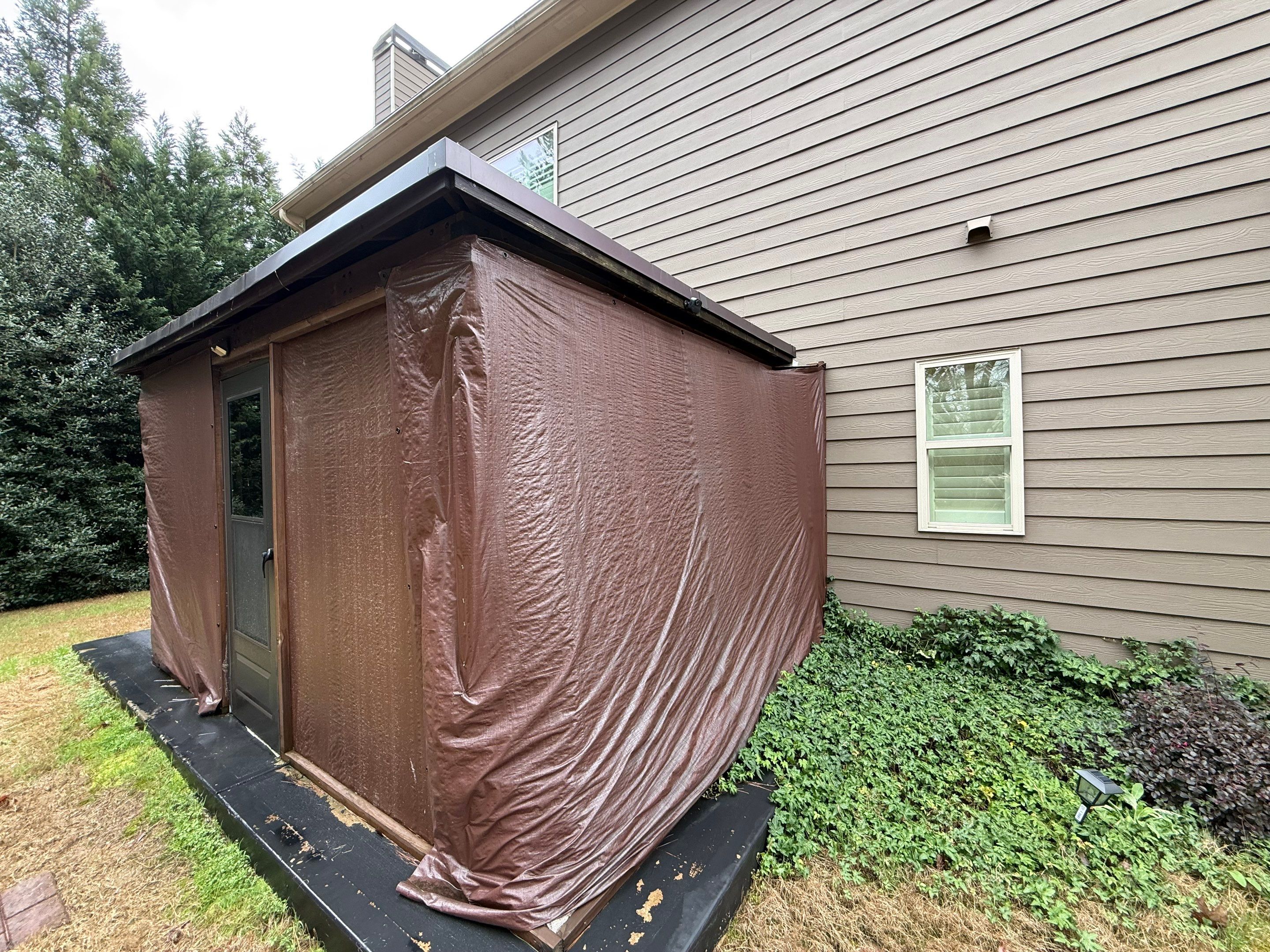 Backyard Pavilion Installation and Garage Door Upgrades in Powder Springs by Swift Home Renovations