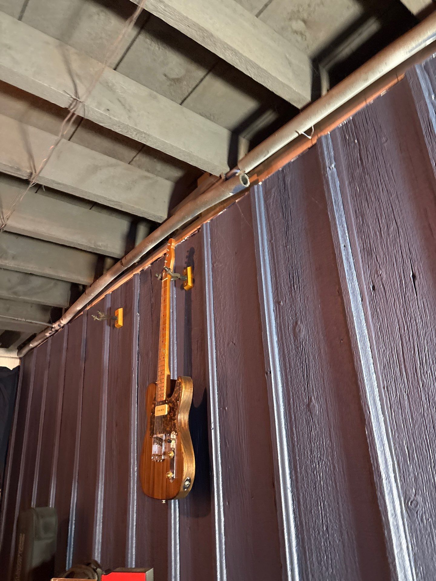 Wanamingo Basement Renovation with Exposed Ceilings and Wood Paneling by CompanyCam Sales Demo