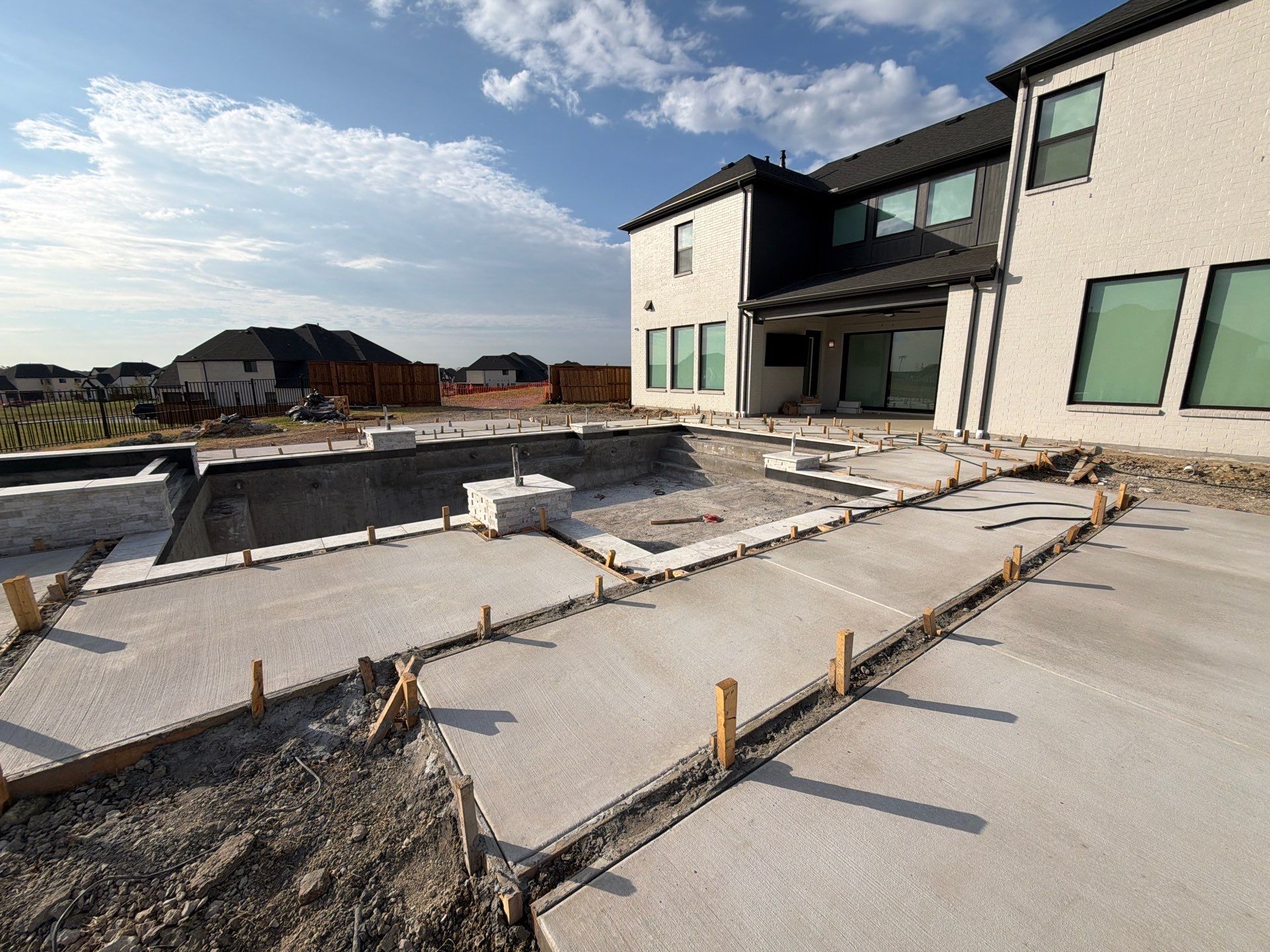 Modern Geometric Pool with Raised Spa, Tanning Ledge and Fire Bowls by Pinnacle Pools and Spas - DFW