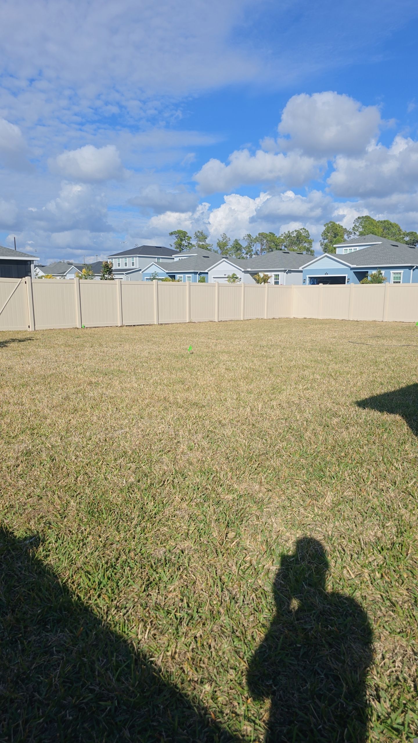 Tan Vinyl Fence in West Port by True Fence LLC