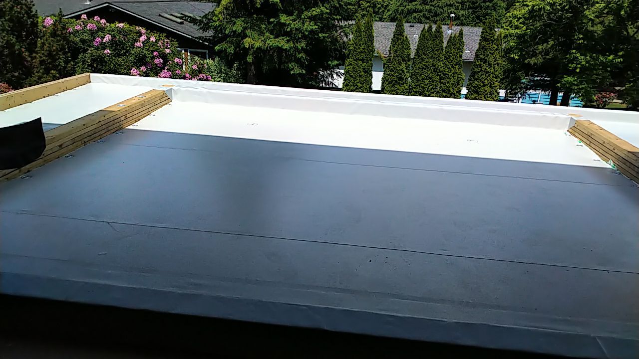 Residential Roofing Installation using Durolast roofing membrane by Top Notch Roofing Inc