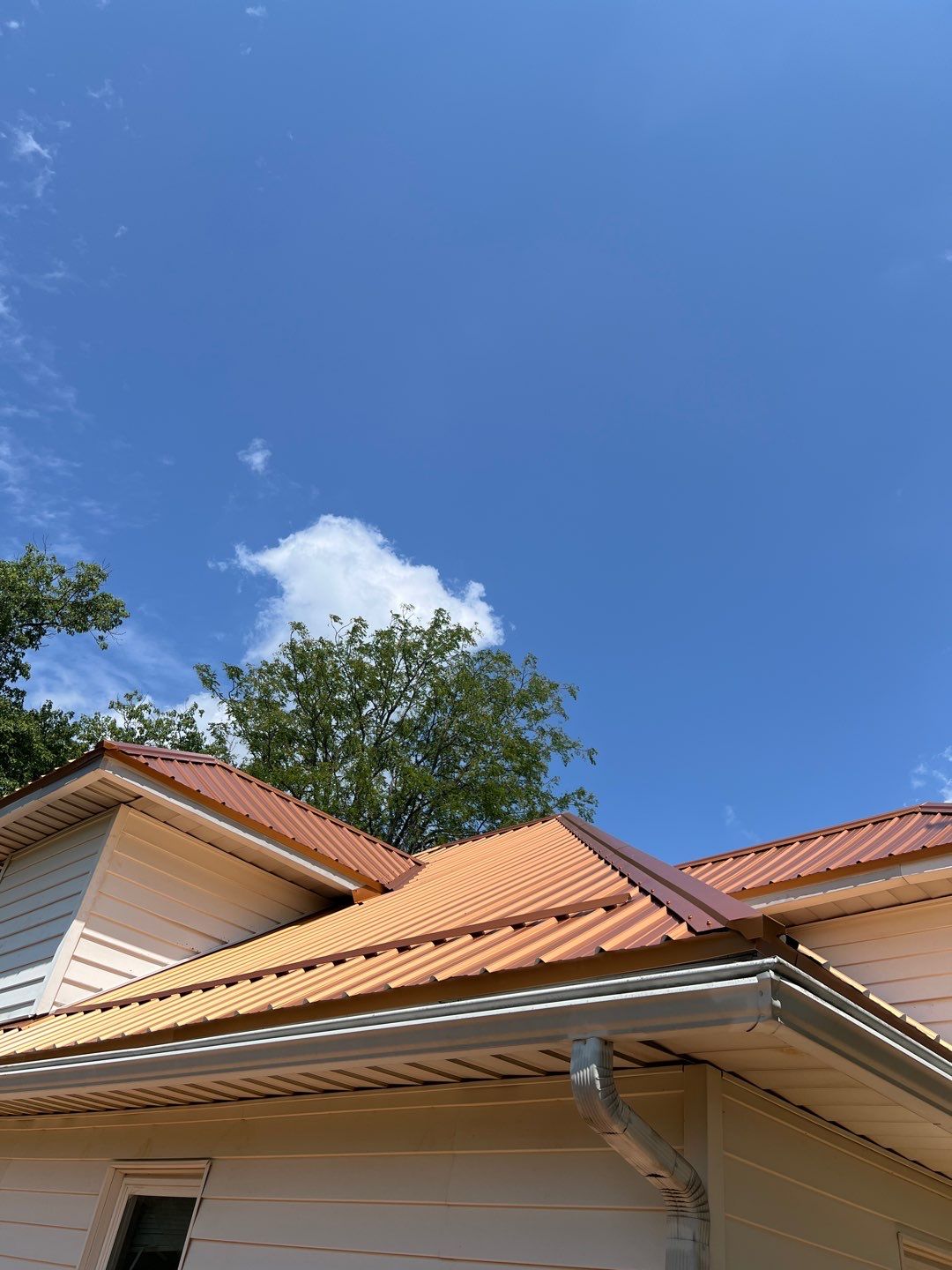 Residential Roofing Installation using Performance Panel Metal - Copper Metallic by RoofX 