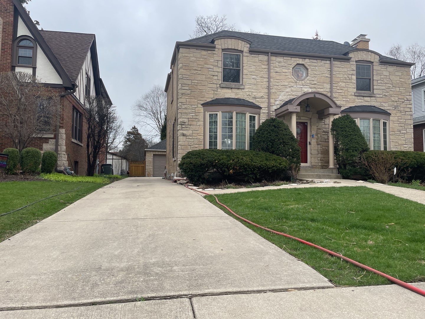 Wood cleaning and staining using Armstrong cloark oil stain by Northern Power Washing LLC.