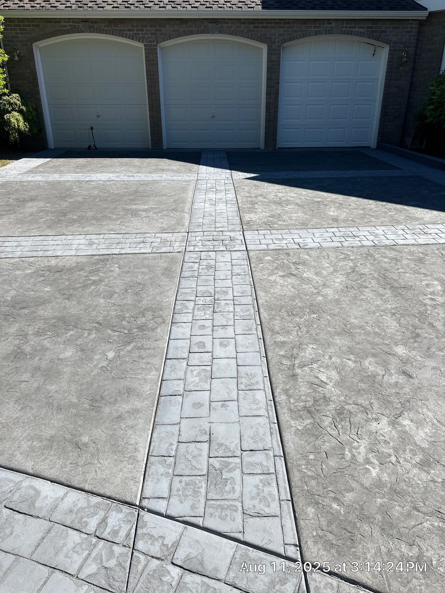 Multi-color Stamped & Sealed Concrete Driveway Renovation | Mukilteo by Jireh Asphalt & Concrete Inc
