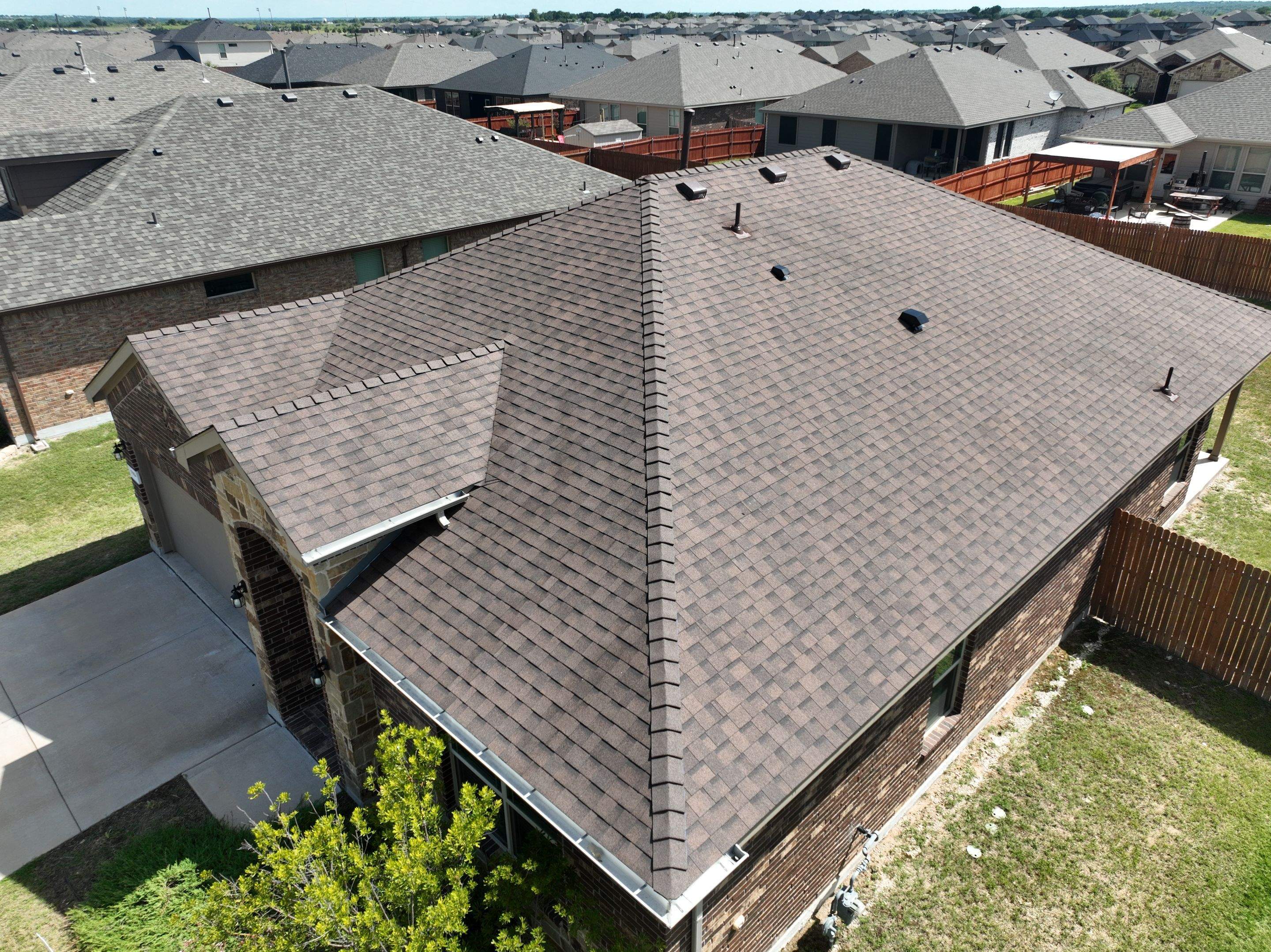 Residential Roofing Installation using IKO Cambridge Dual Brown by OneSource Roofing and Restoration