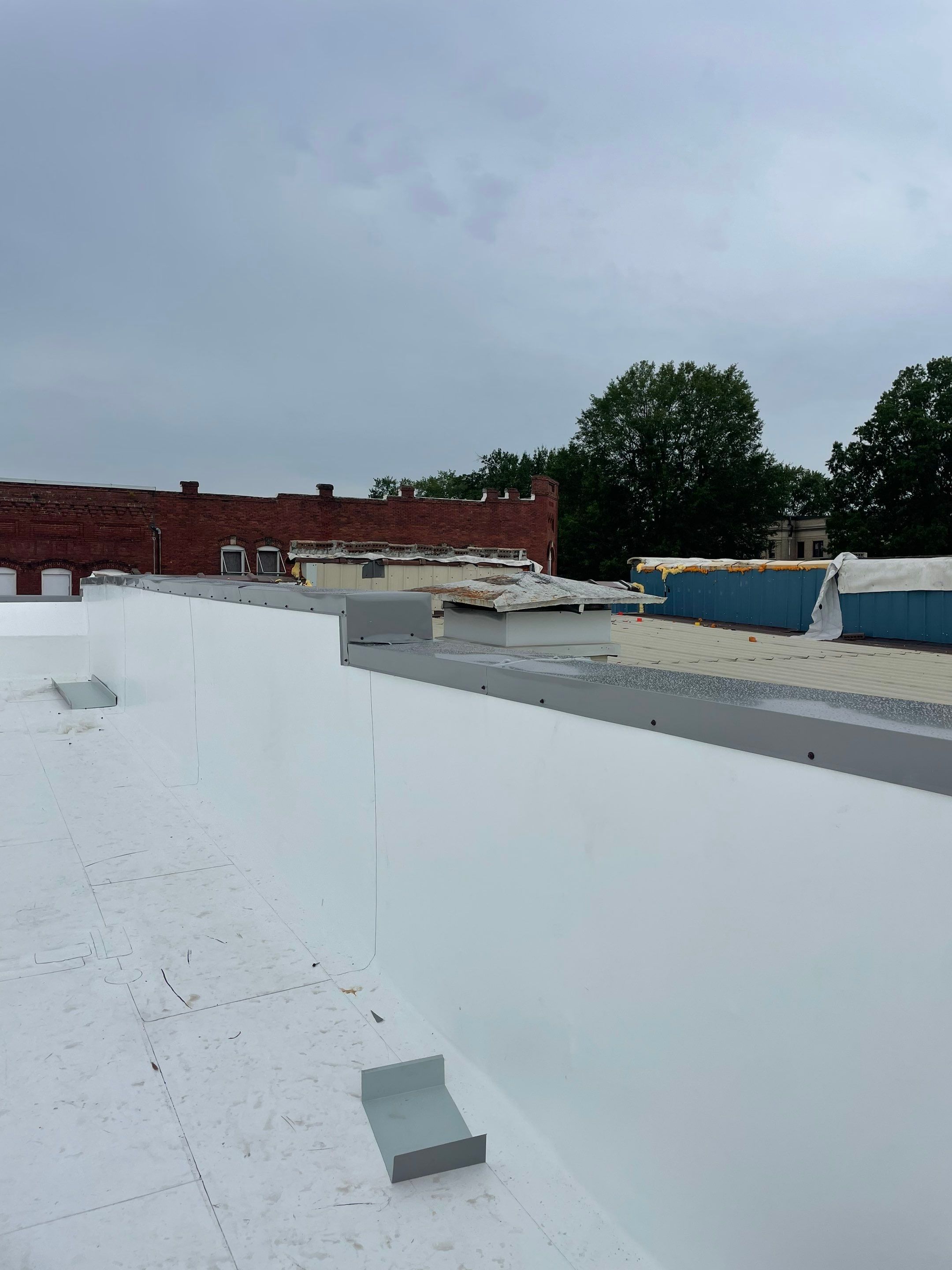 Commercial Roofing Installation in DeQueen, AR, using 50 mil PVC by Hostetler Roofing