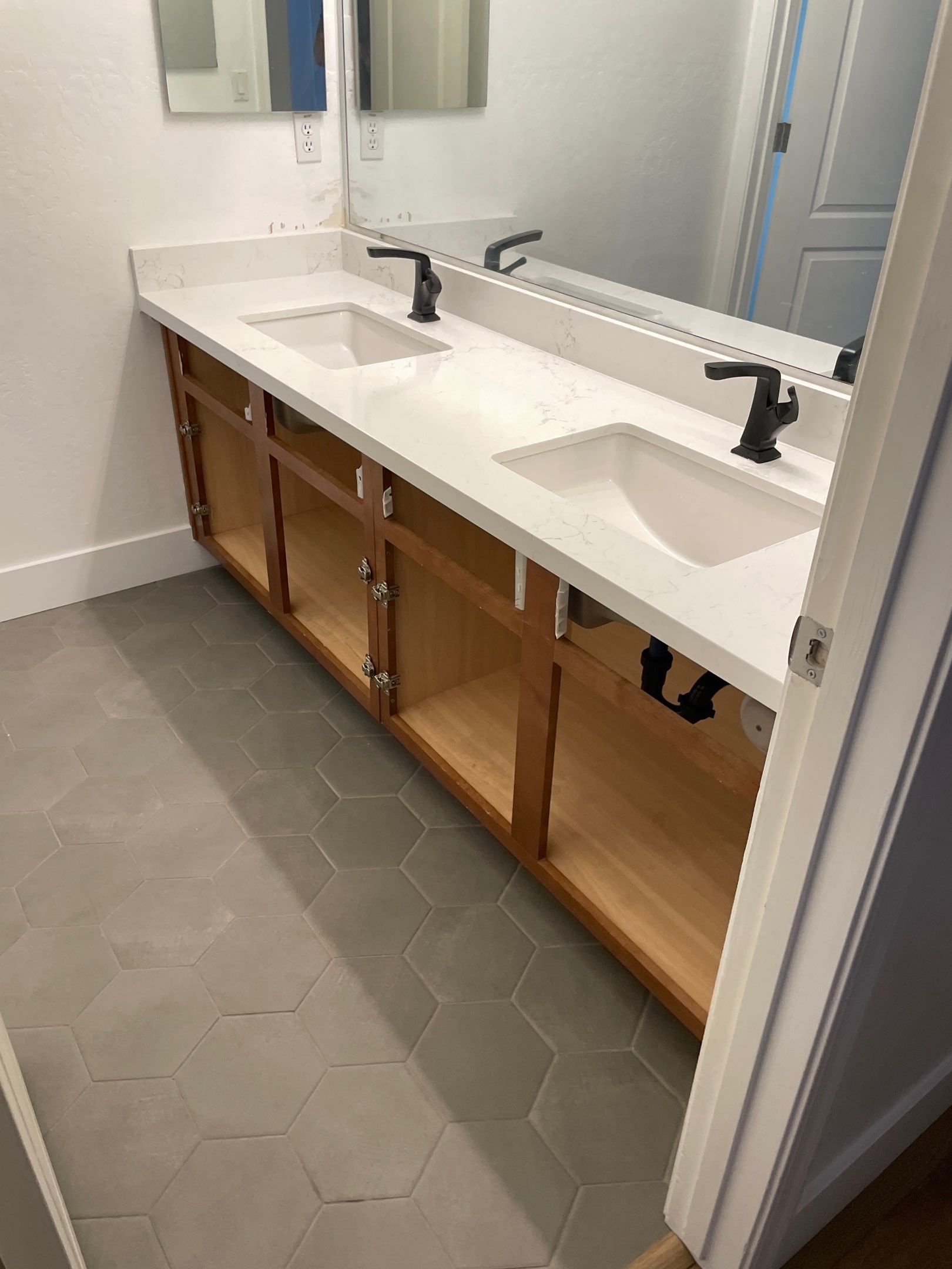 New Shower, Bathroom Floor and Countertops by Footprints Floors of Chandler