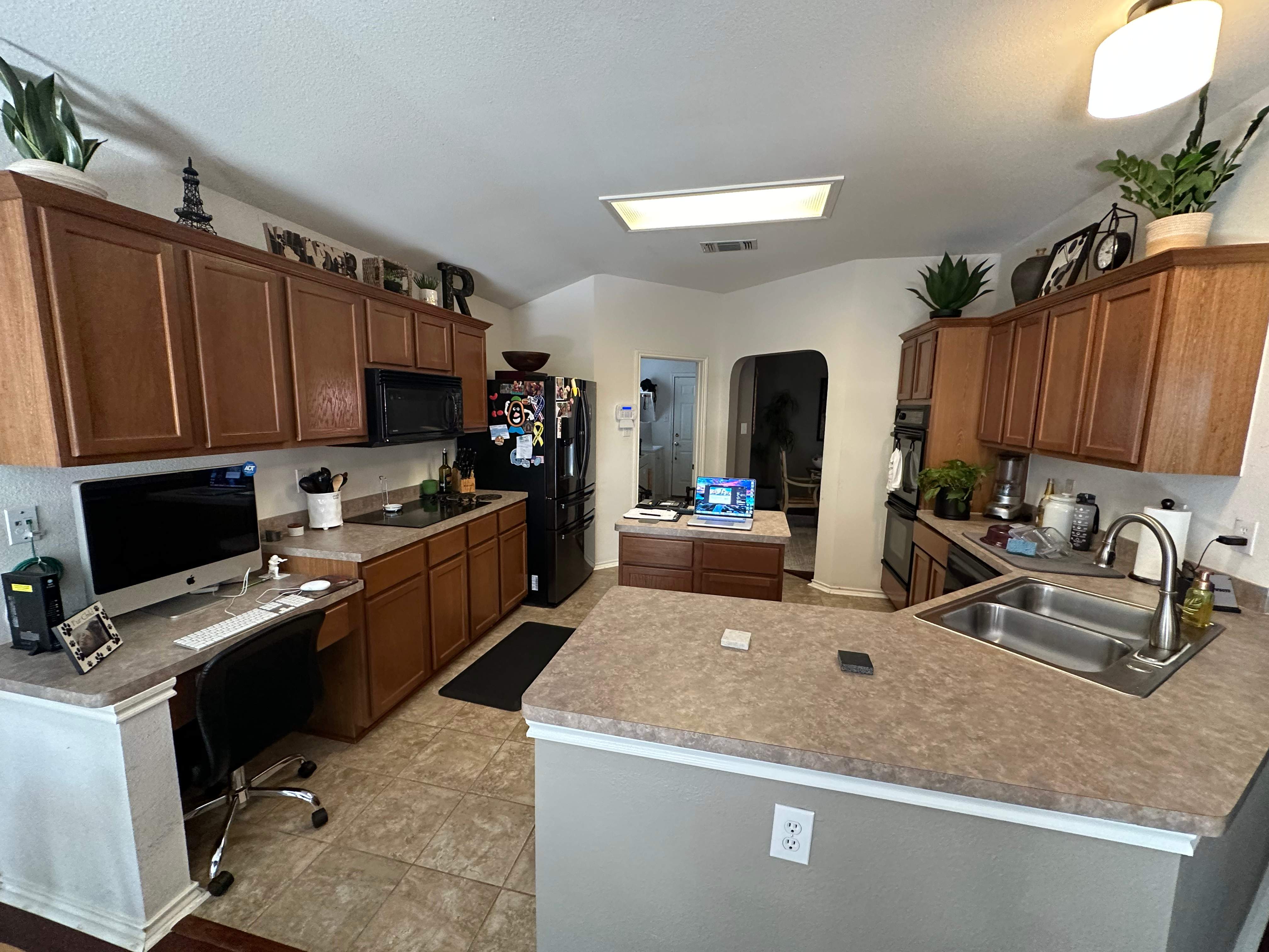 Northwest San Antonio Kitchen Remodel | Bright White Cabinets & Open Layout by Legacy Bath and Kitchen