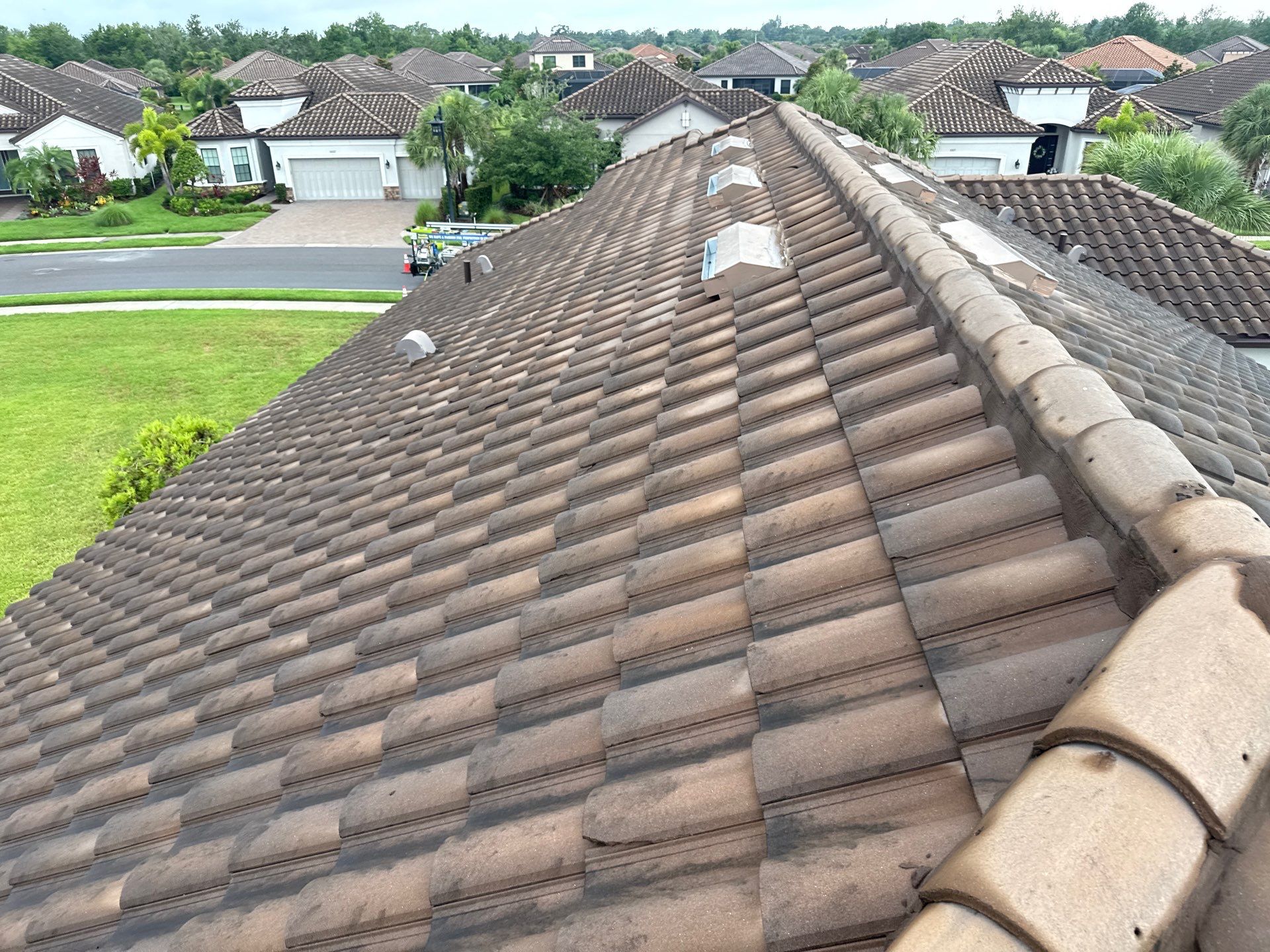 Concrete Tile Roof, Paver Driveway & Lanai Cleaning – Artisan Lakes Esplanade, Palmetto, FL by Sunshine AquaWash