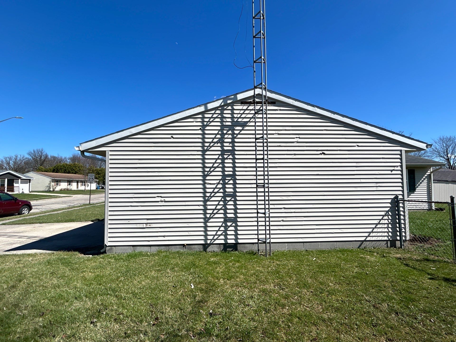 Storm Damage Residential Roof and Siding Installation by WIW Enterprises Inc