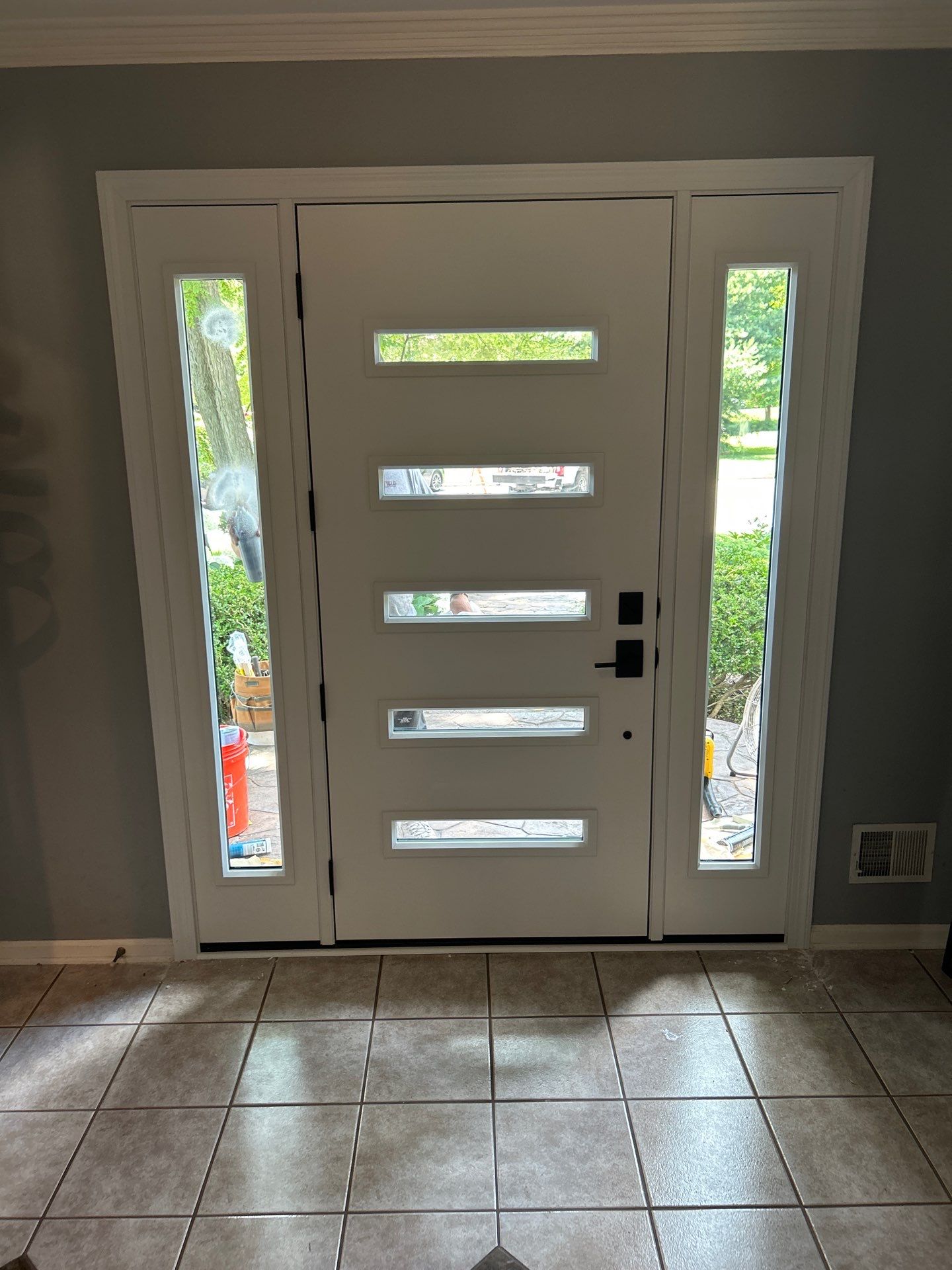 Black Entry Door with Sidelights and Modern Glass in Indianapolis by Merrifield Exteriors, LLC