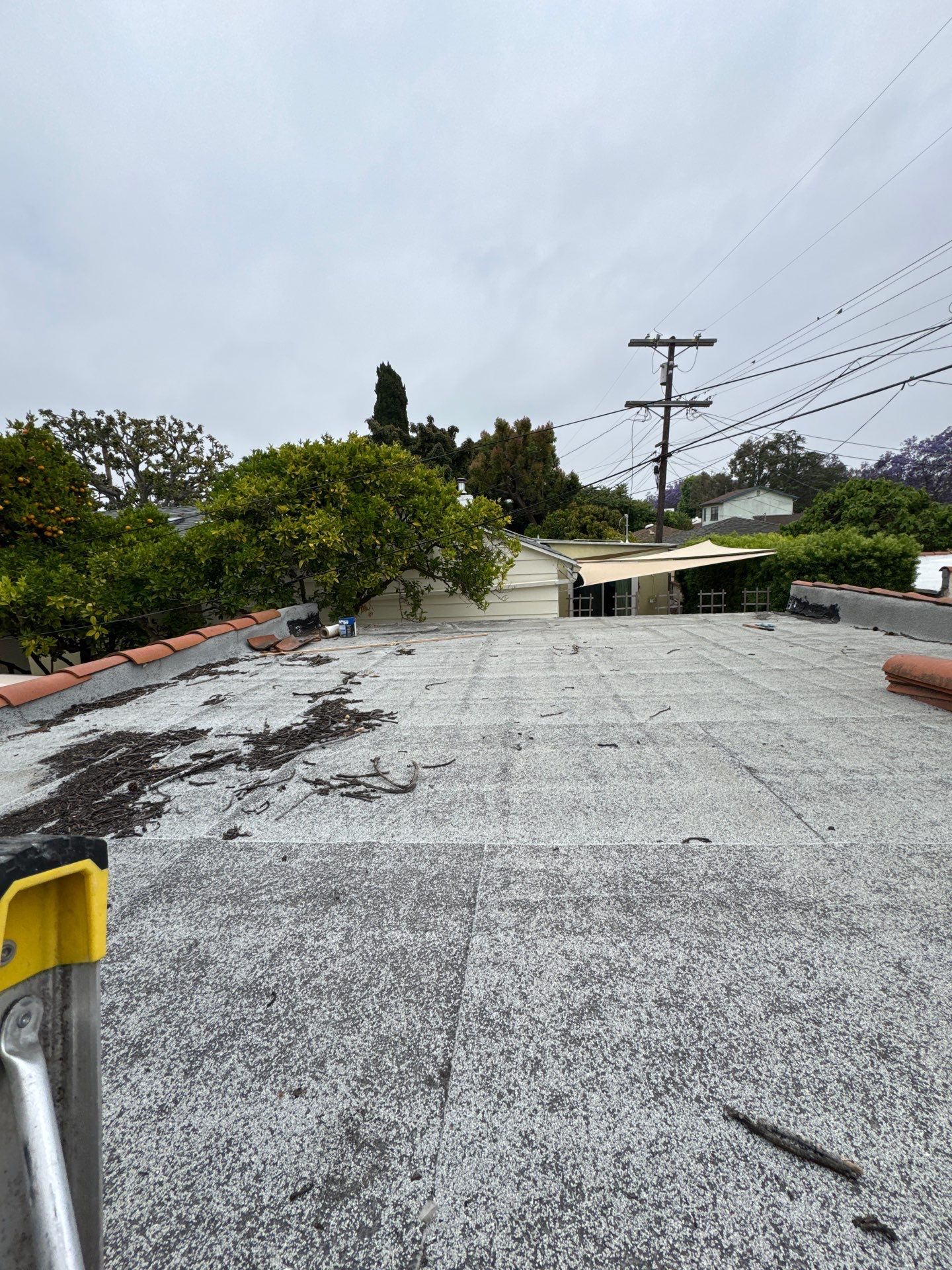 Tile Reset and Silicone Membrane Installation by Hull Brothers Roofing