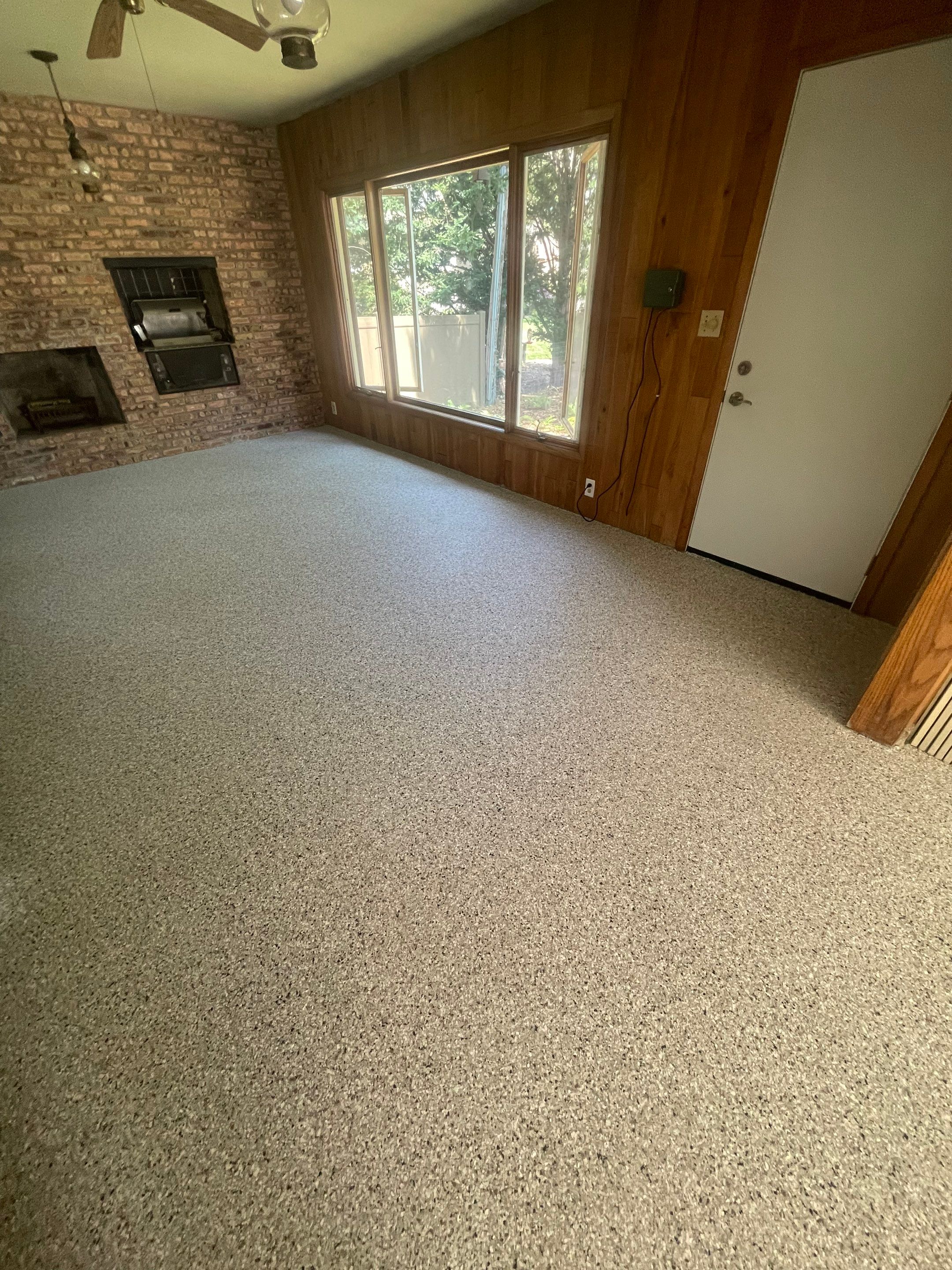 Sioux Falls Garage and Sunroom Concrete Coating with Coyote Flake by Select Painting, Coatings & Garage Cabinets