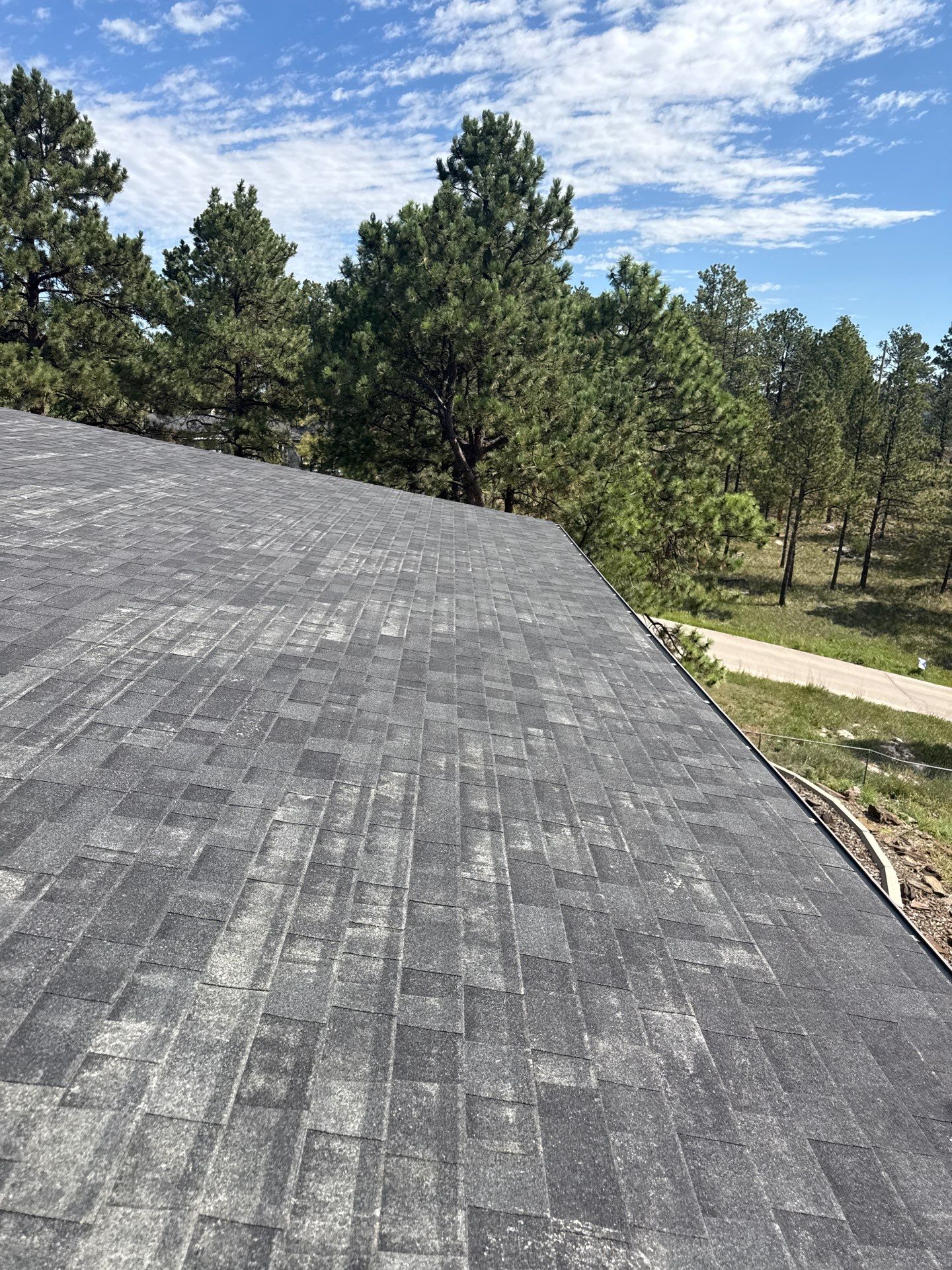 Full Architectural Shingle Installation for Contemporary Rapid City Residence by Weather-Tite Exteriors LLC