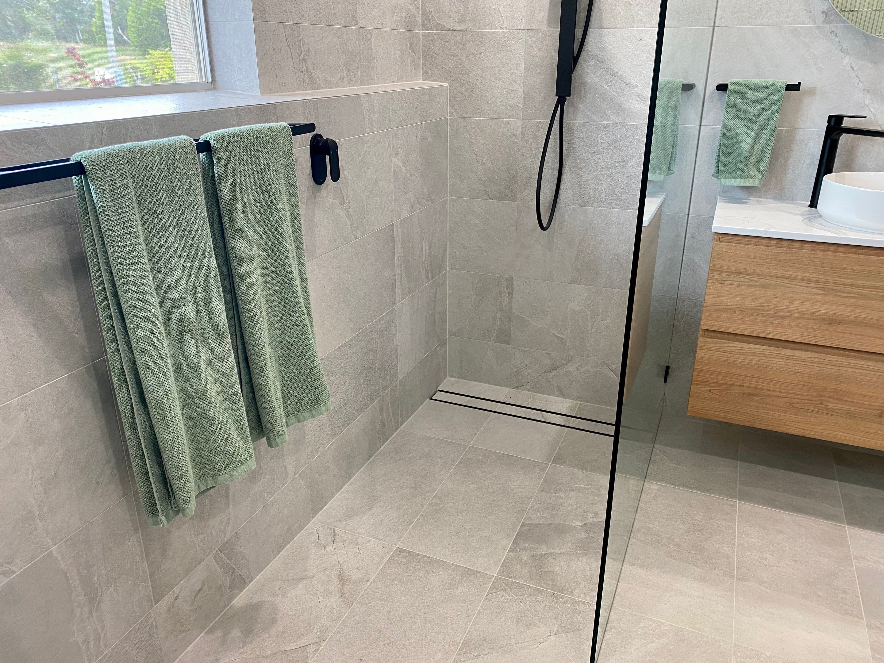 Bathroom Renovation using XROCK 36W White natural 300 x 600 by Re-seal Bathrooms