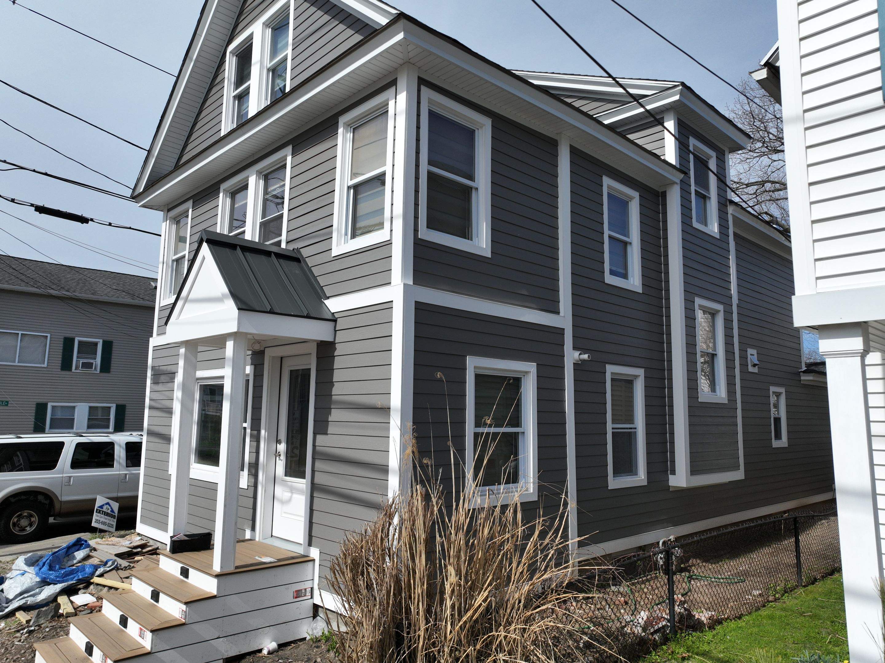Siding Installation using Hardie Plank Aged Pewter by A Plus Exterior