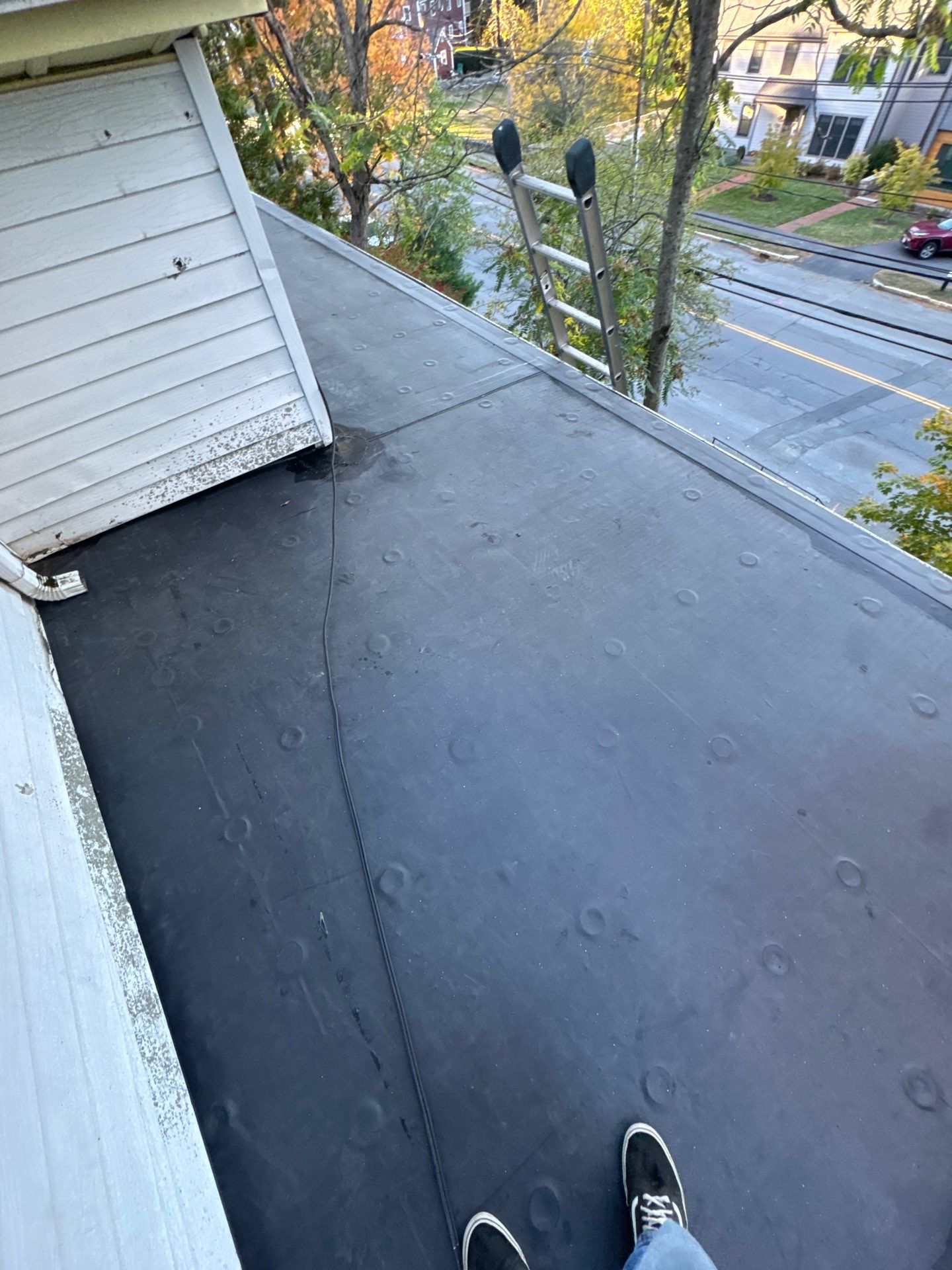 Full Roof & Porch EPDM Replacement with Skylight and Chimney Repairs by Mighty Dog Roofing of Greater Middlesex County