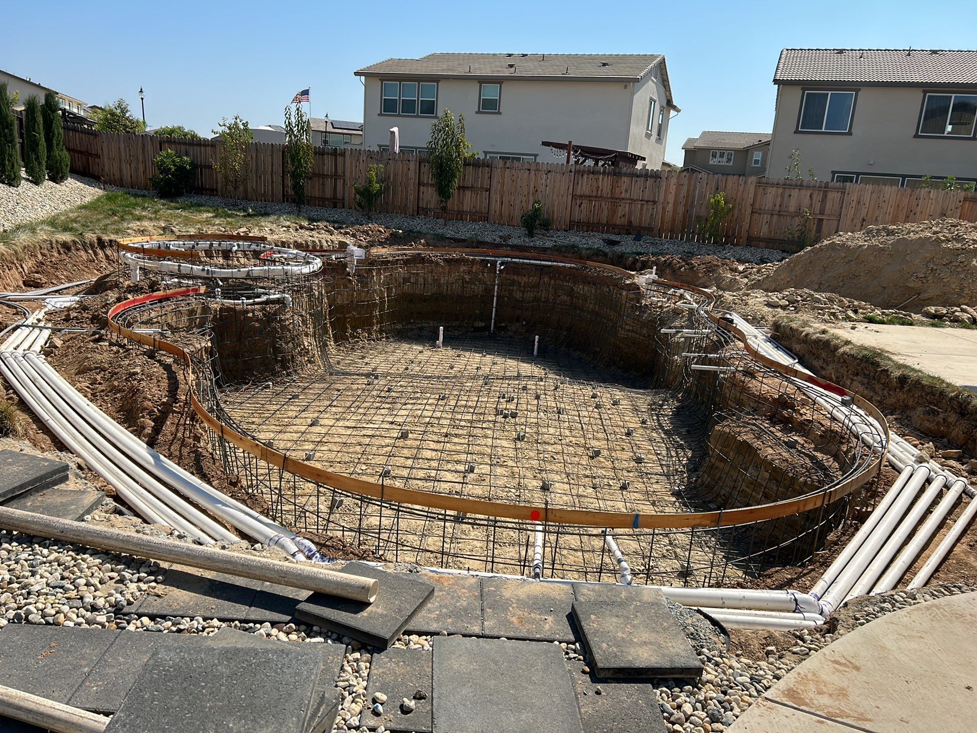New Pool and Spa with Iridescent Blue Tile in Roseville by Dolphin Pools and Spas