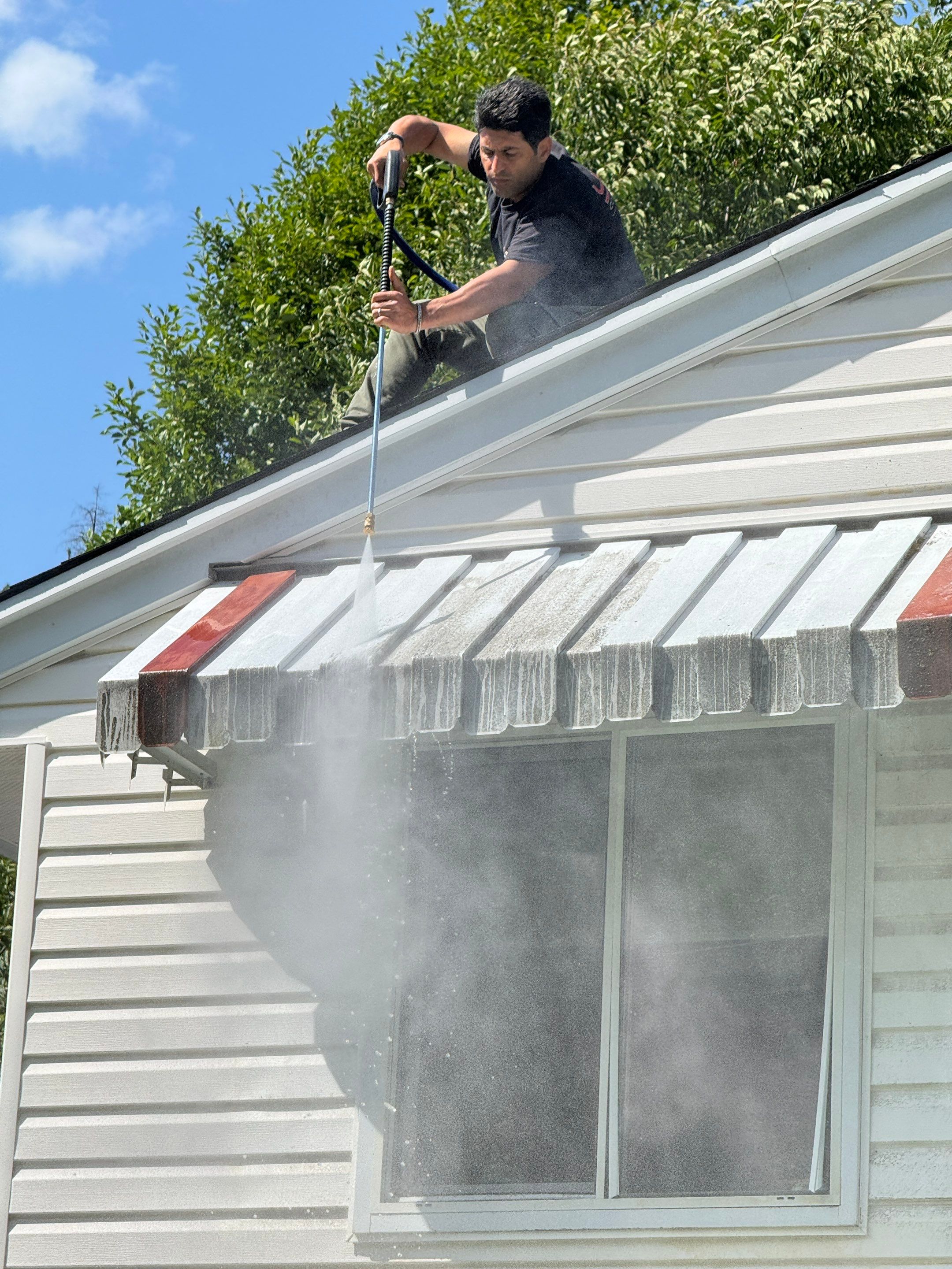 Repair Damaged Gutter & Power Wash House Siding by YVR Construction Group
