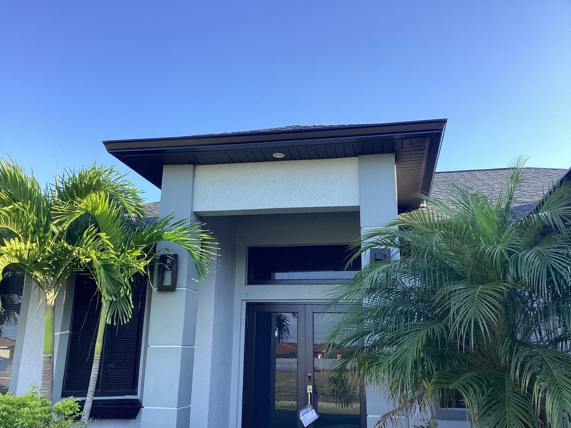 Black Seamless Gutters using 6 Inch Seamless Gutters in Cape Coral FL by Gutter Professors