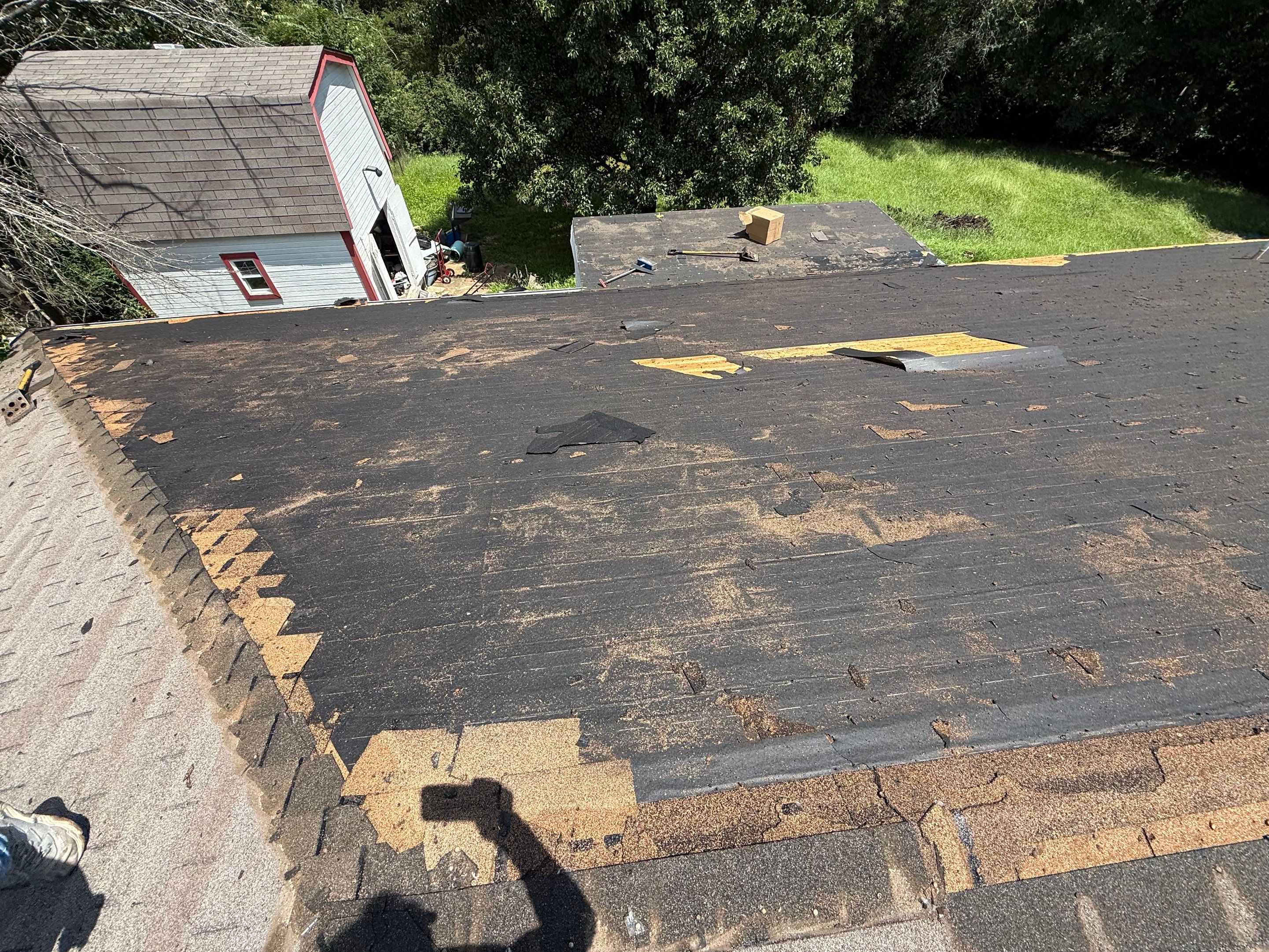 2 layers tear off & installation of new architectural shingles. by In & Out Construction & Remodeling, LLC