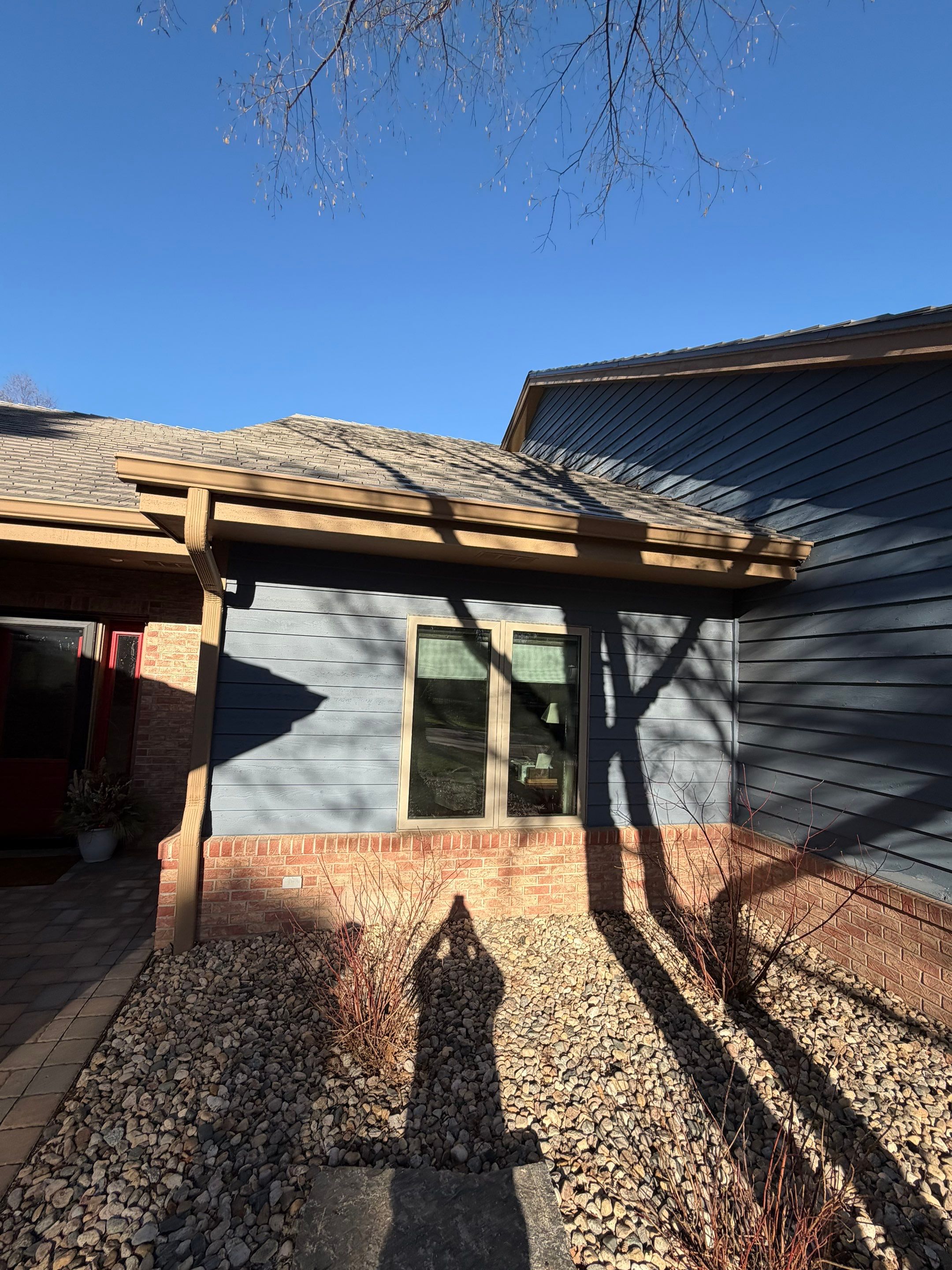 Residential Exterior Painting and Siding Refresh in Sioux Falls by Select Painting, Coatings & Garage Cabinets